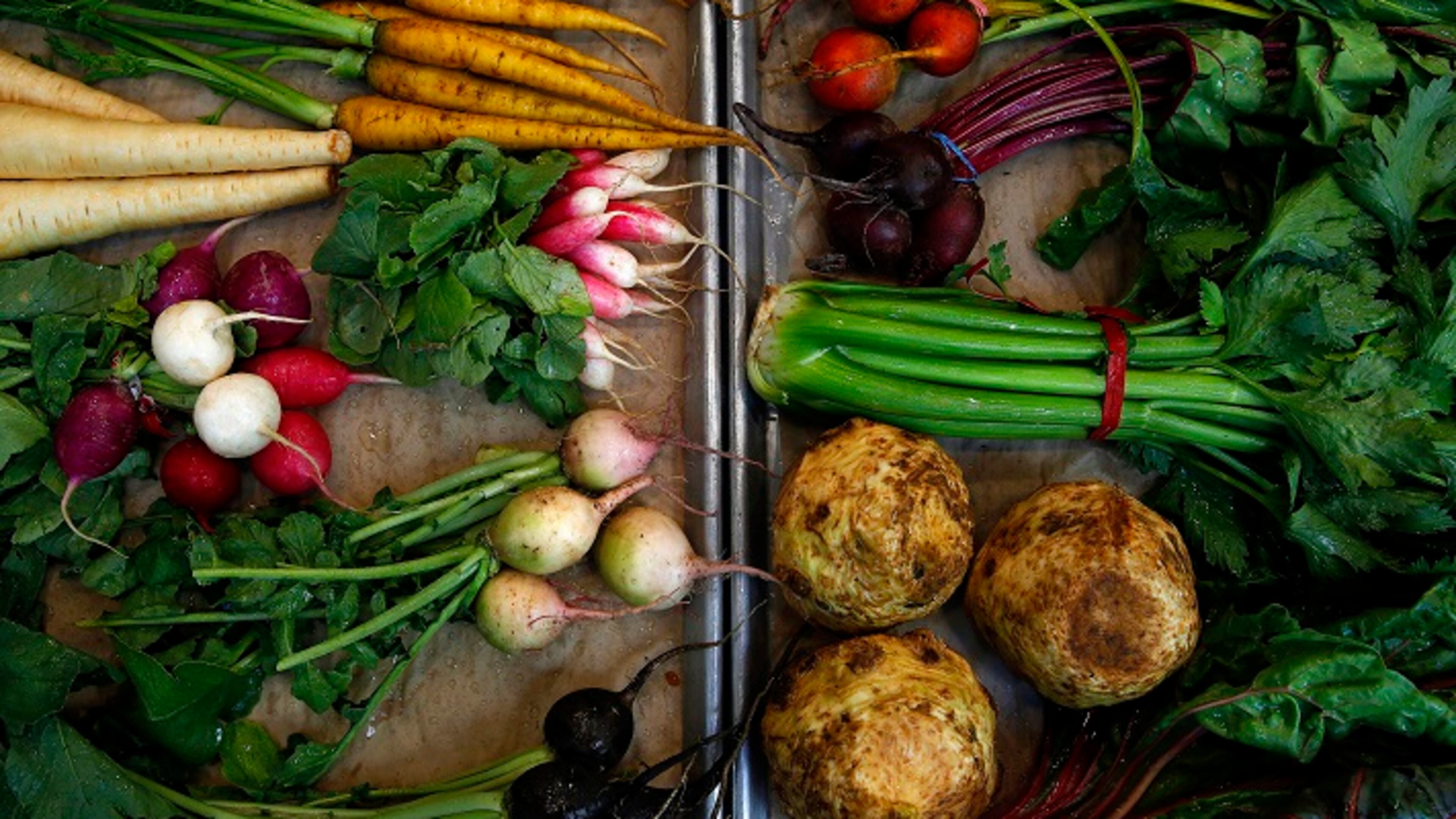 Spring chef Tony Esnault uses seasonal vegetables from the farmer's market to prepare his Legumes de Saison. (Liz O. Baylen/Los Angeles Times/TNS)