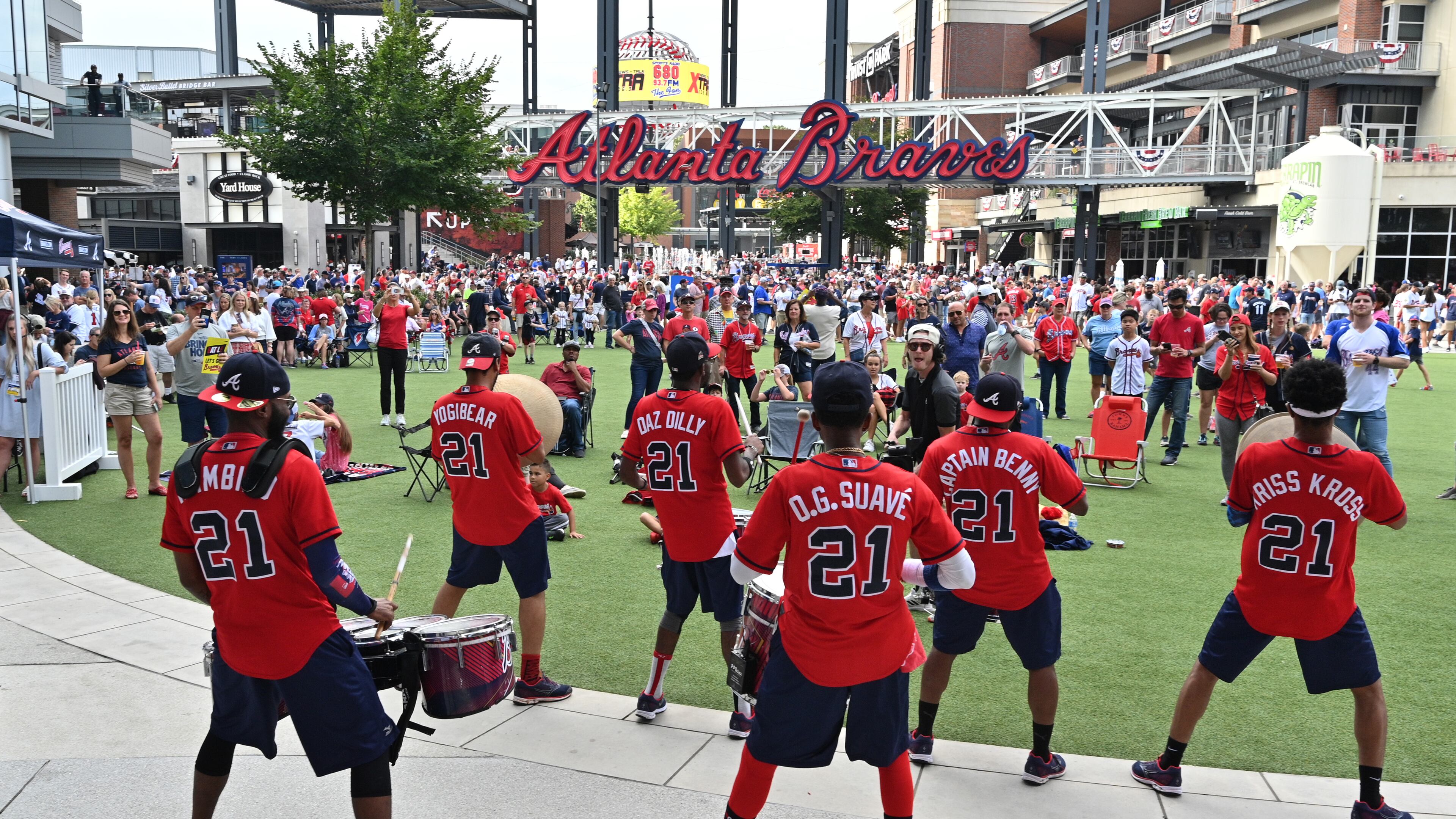 Getting fired up for Game 4: The Heavy Hitters drumline entertains baseball fans at The Battery Atlanta Tuesday prior to Game 4 of the National League Divisional Series between the Braves and Brewers.