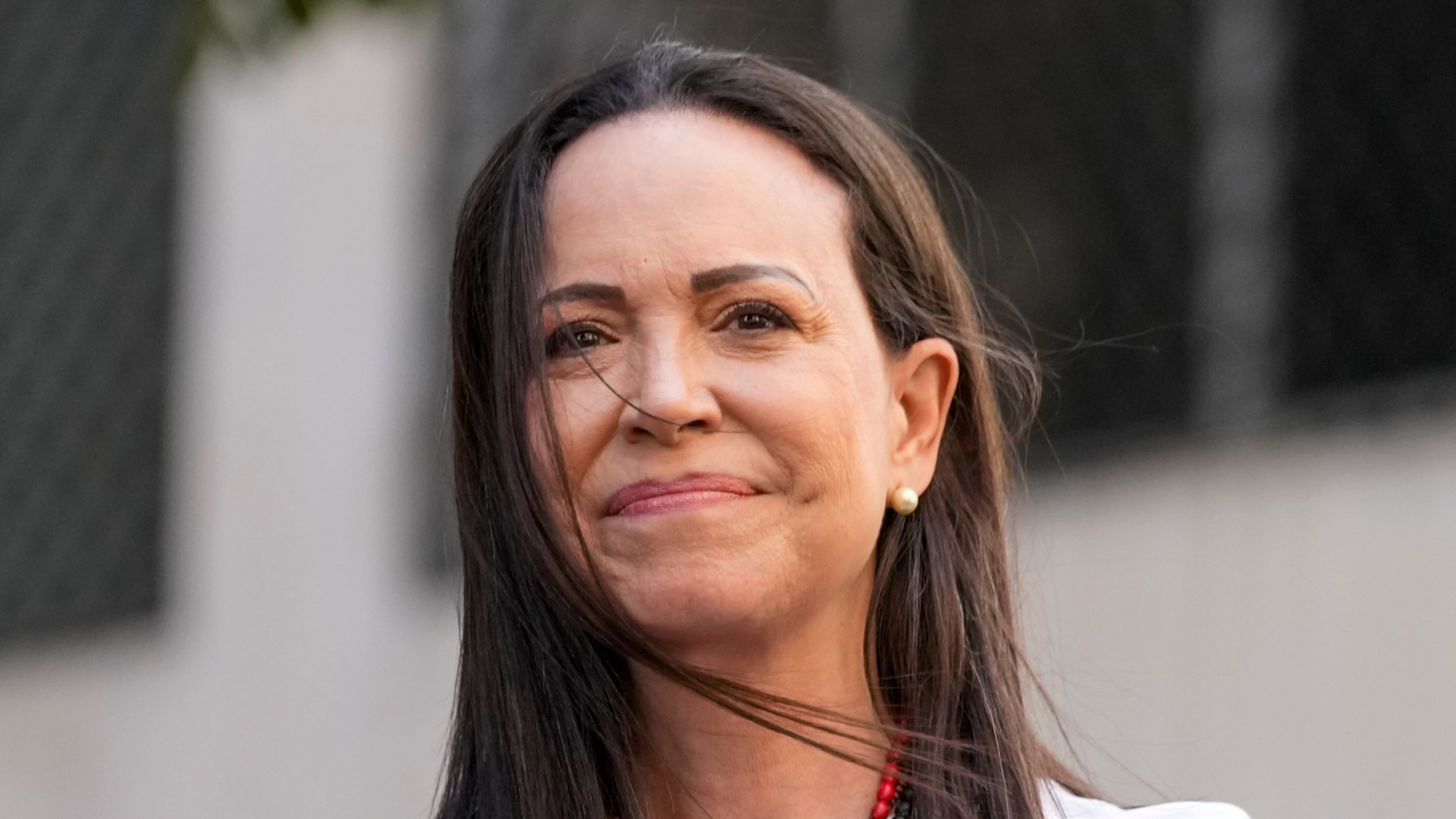 FILE - Opposition leader Maria Corina Machado gestures to supporters during a protest against President Nicolas Maduro the day before his inauguration for a third term, in Caracas, Venezuela, Thursday, Jan. 9, 2025. (AP Photo/Ariana Cubillos, file)
