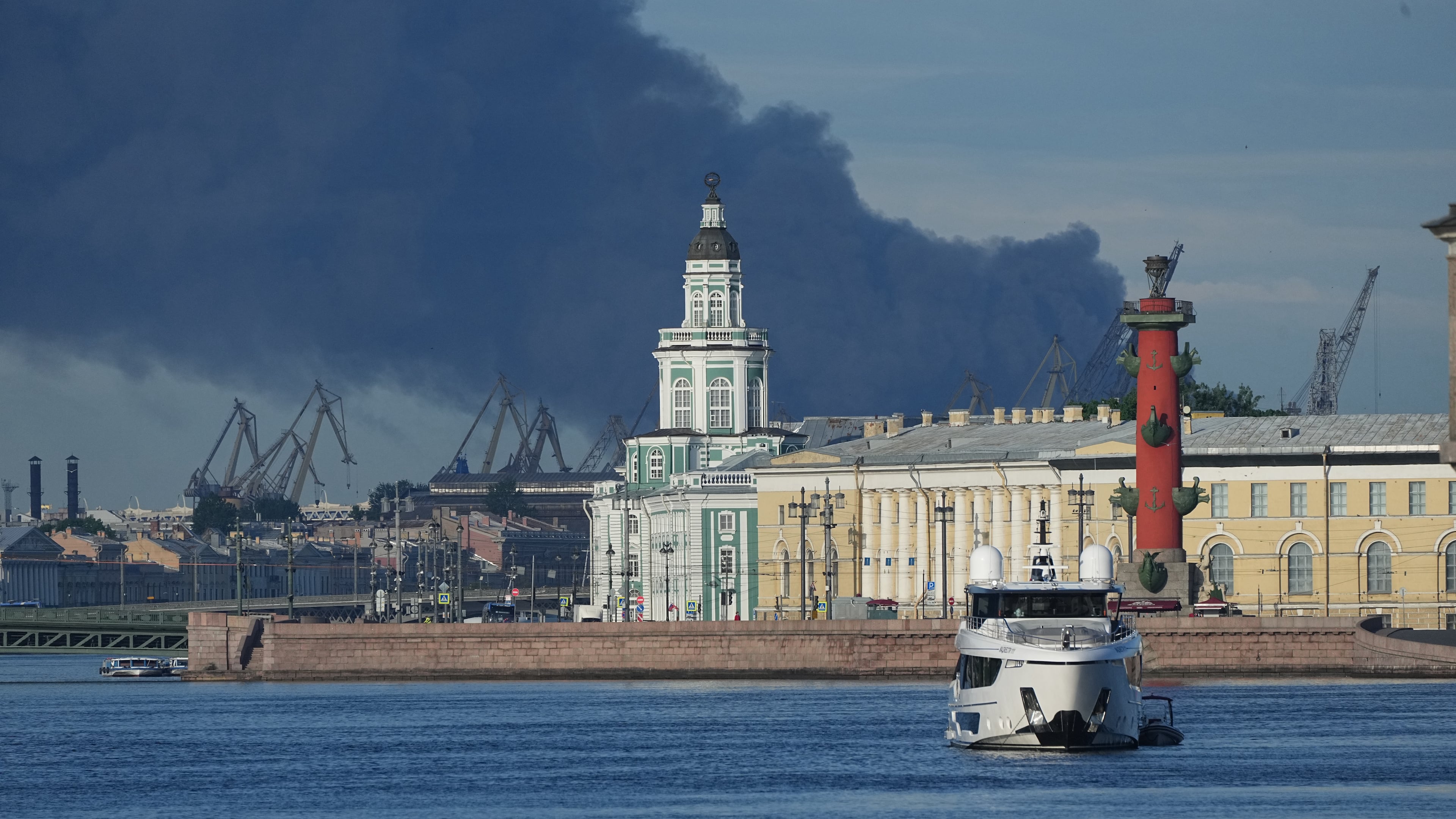 A plume of black smoke is seen over the port of St. Petersburg, Russia, Wednesday, June 3, 2026, after a Ukrainian drone attack. (AP Photo)