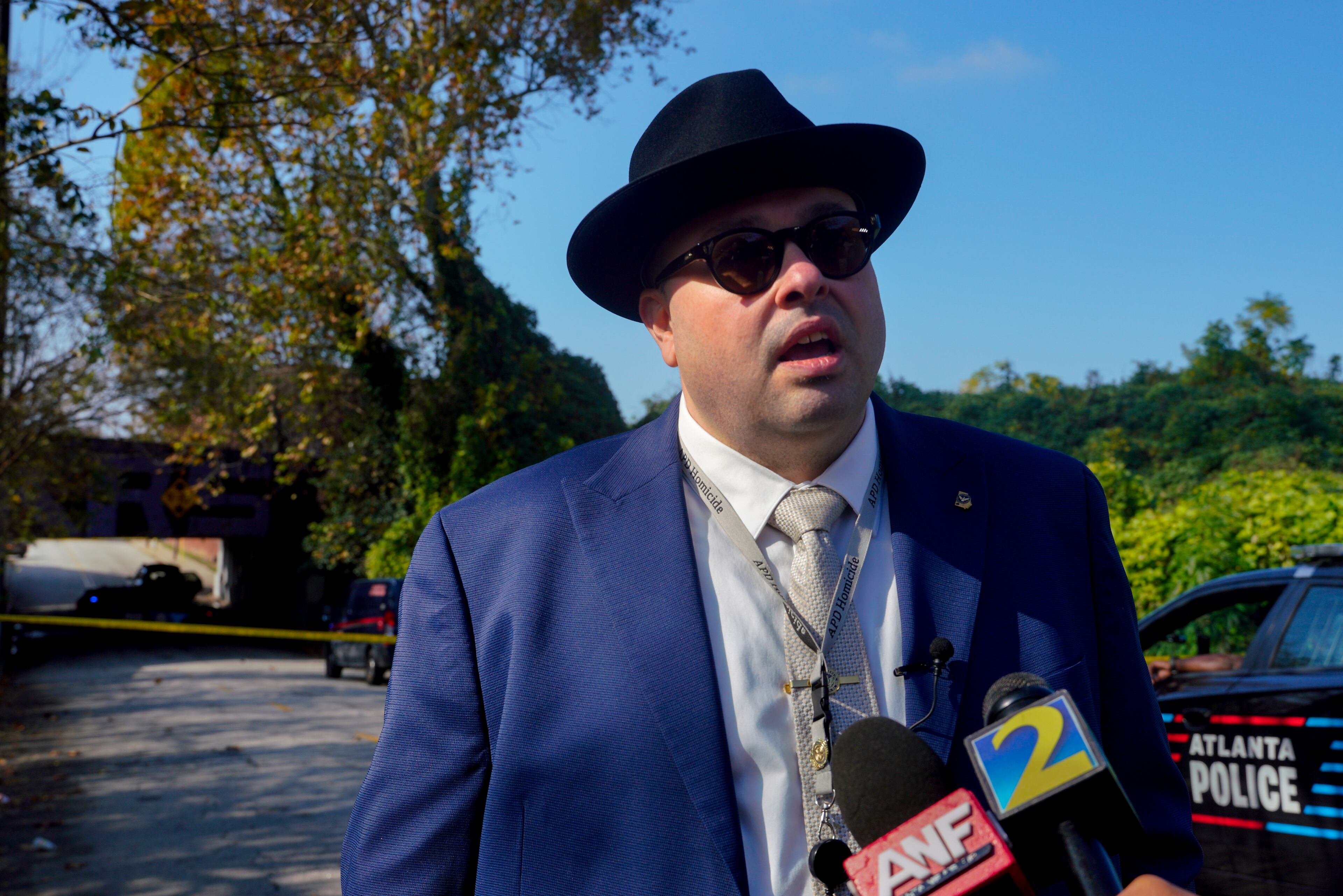 Atlanta police Detective Andrew Smith gives an update on a fatal shooting on Glenn Street on Tuesday.