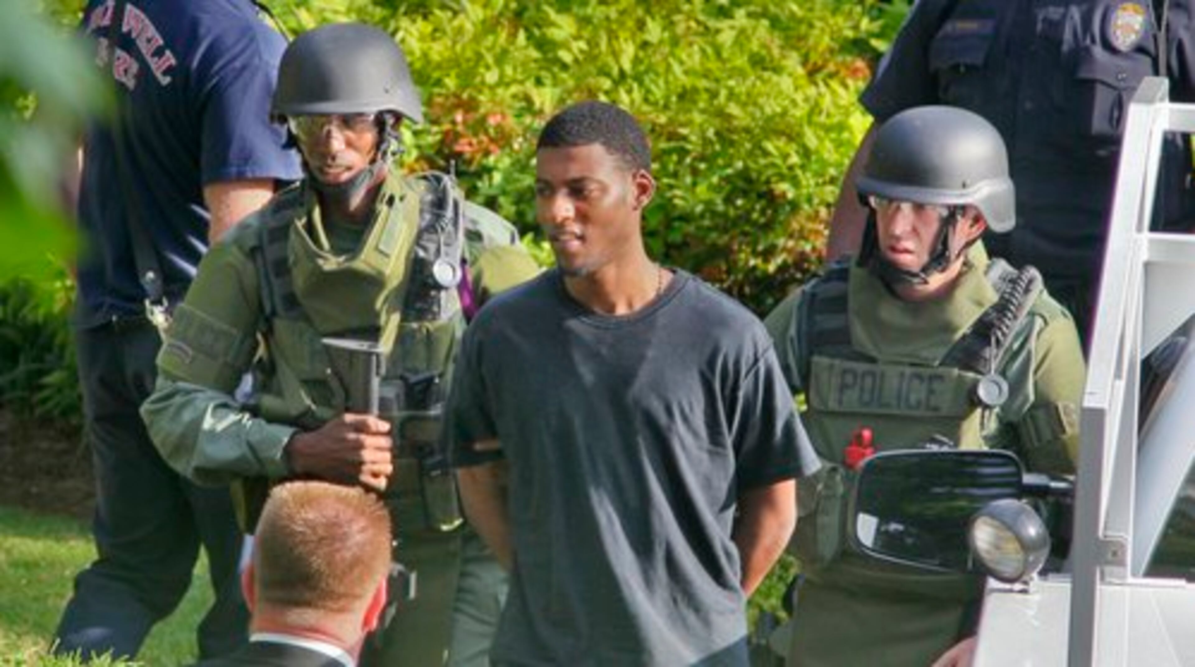 A man is taken into custody Tuesday morning, ending the hostage standoff at Aspen Pointe apartments in Roswell.