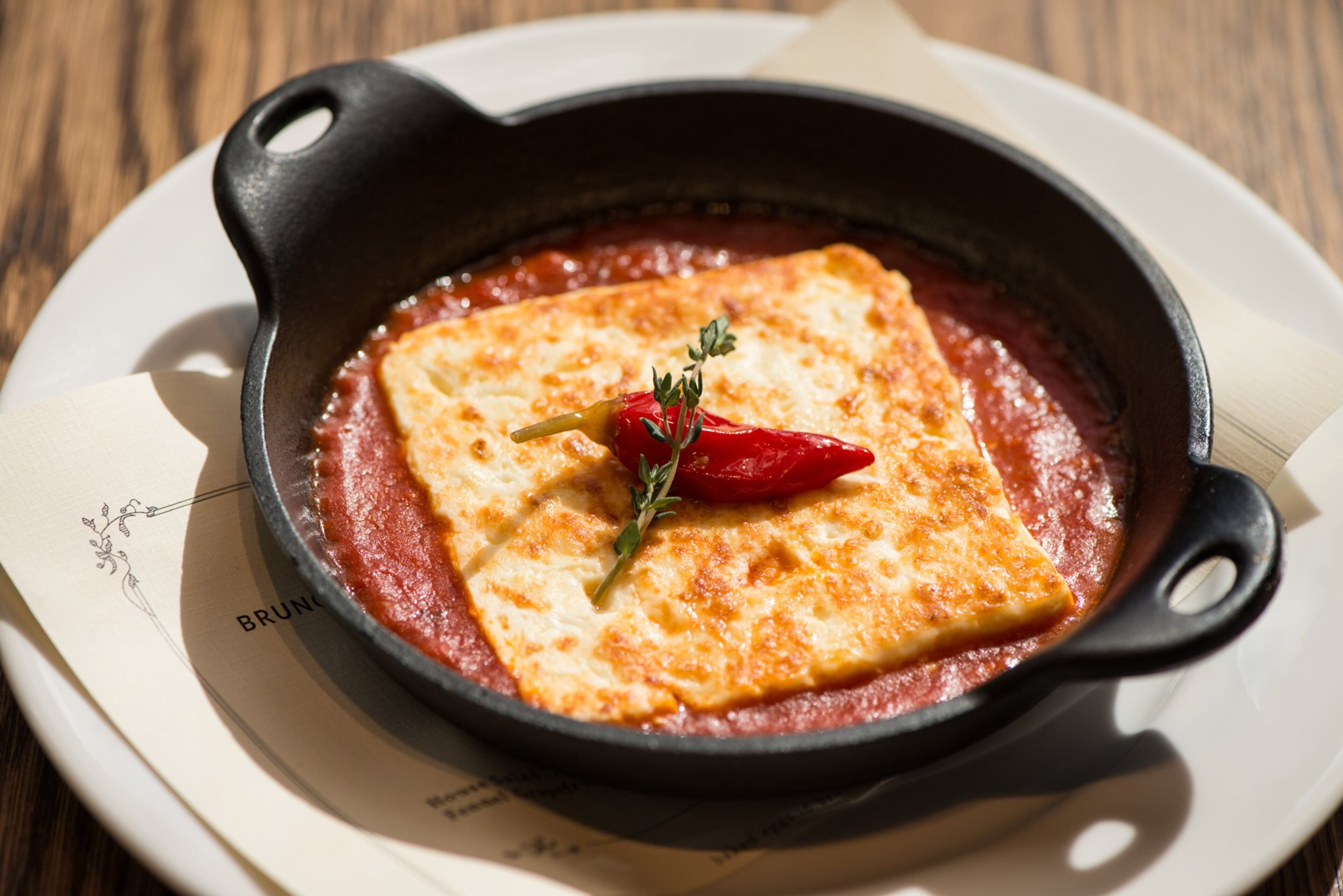 Mediterranea baked feta in red sauce. Photo credit- Mia Yakel.