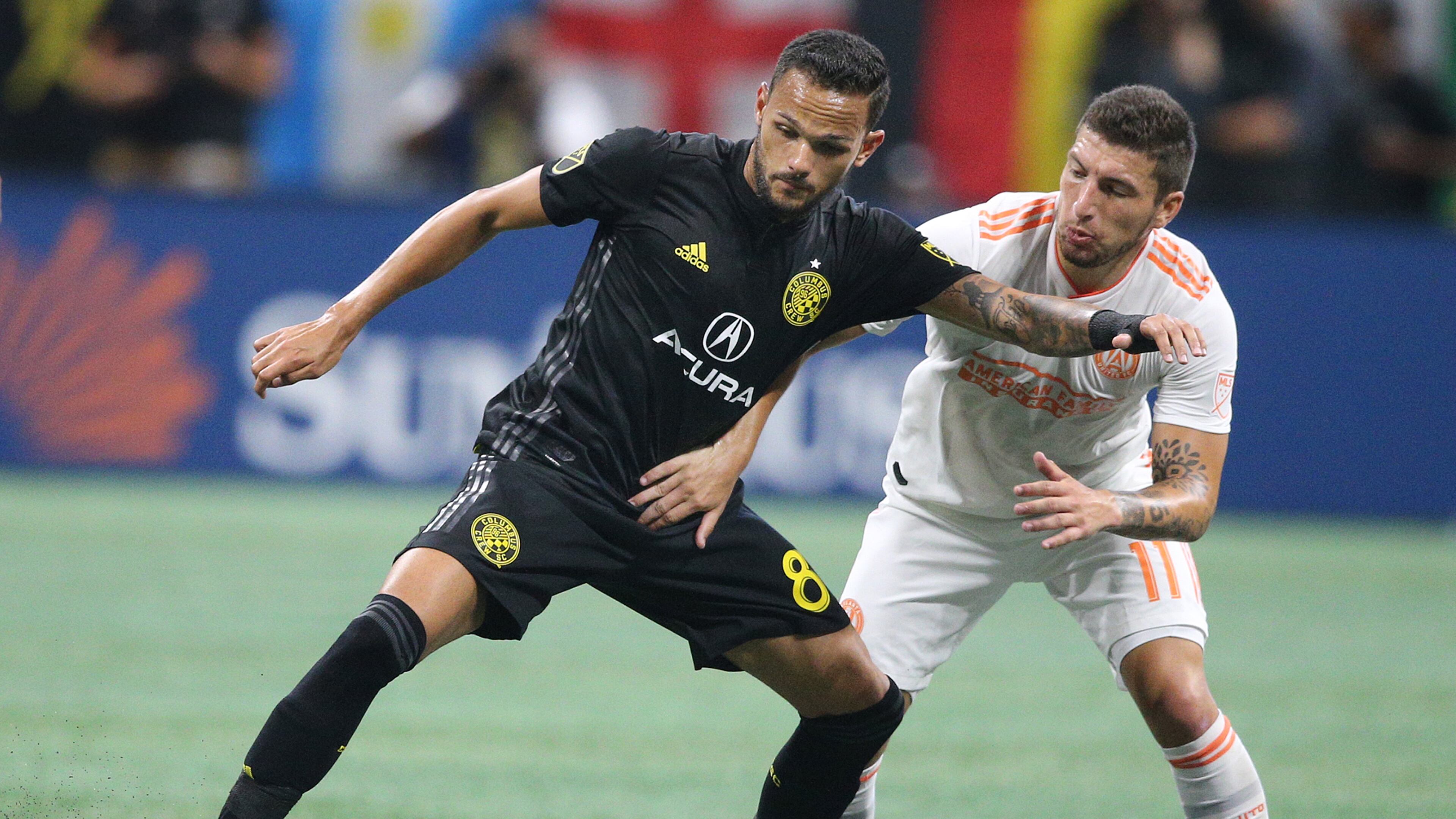 August 19, 2018 Atlanta: Atlanta United midfielder Eric Remedi and Columbus Crew midfielder Artur battle for the ball during the second half in a MLB soccer match on Sunday, August 19, 2018, in Atlanta. Curtis Compton/ccompton@ajc.com