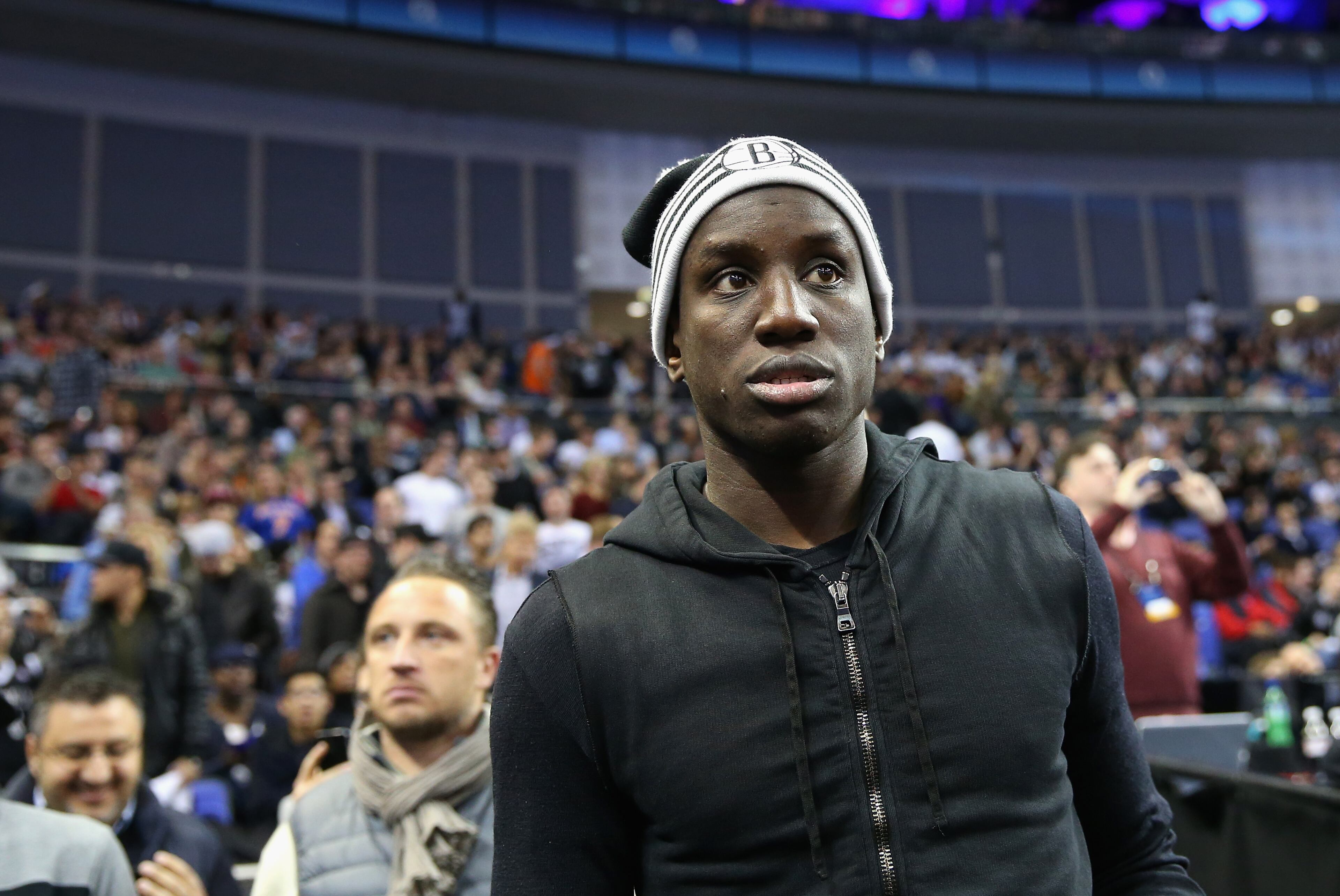 Demba Ba of Chelsea arrives during the Eastern Conference NBA match between Brooklyn Nets and Atlanta Hawks at O2 Arena on January 16, 2014 in London, England.