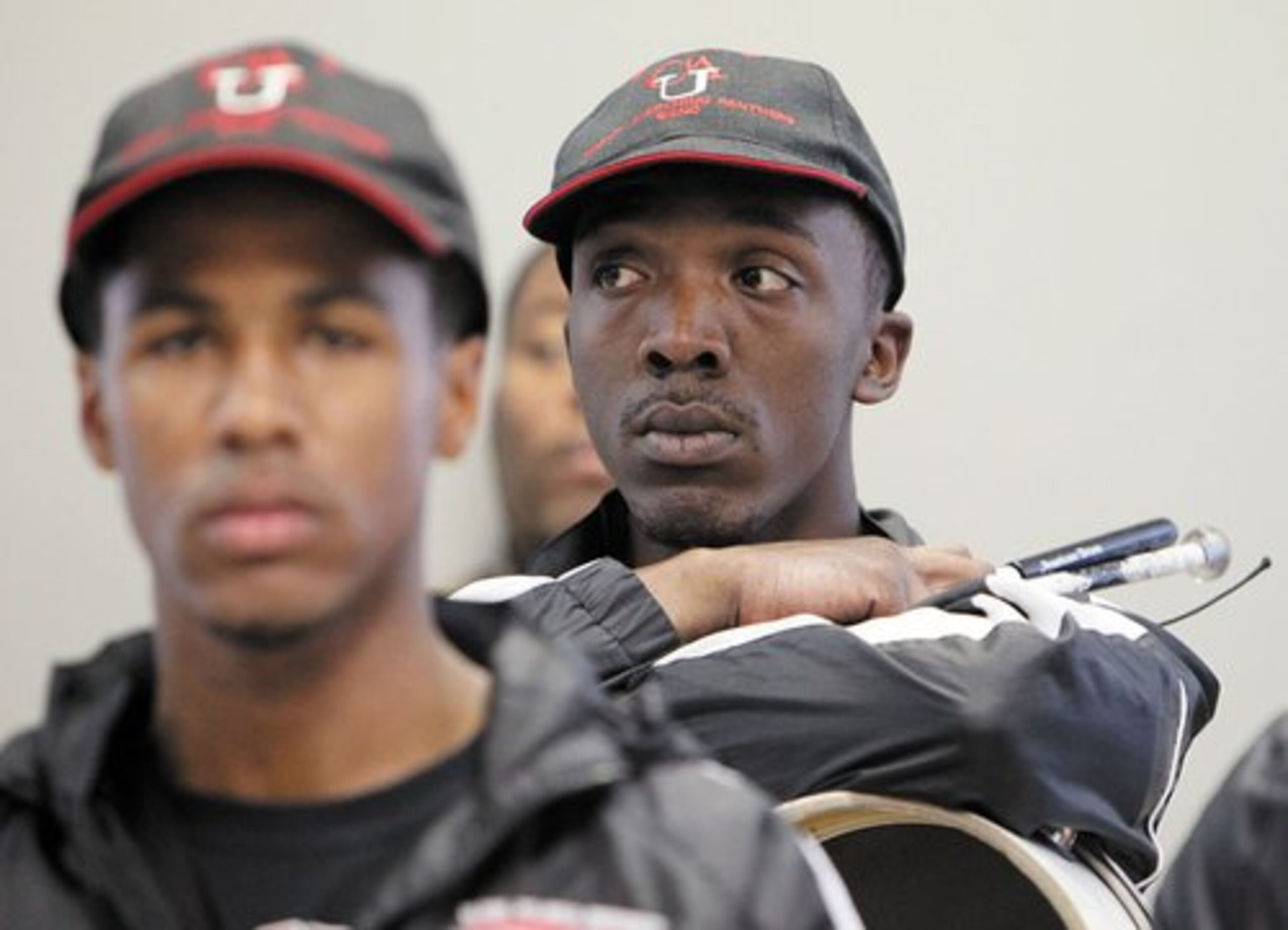 Drum corps member Rashad Jones (right) listens as Clark Atlanta University officials announce that their Mighty Marching Panthers band will compete in the Honda Battle of the Bands Invitational Showcase.