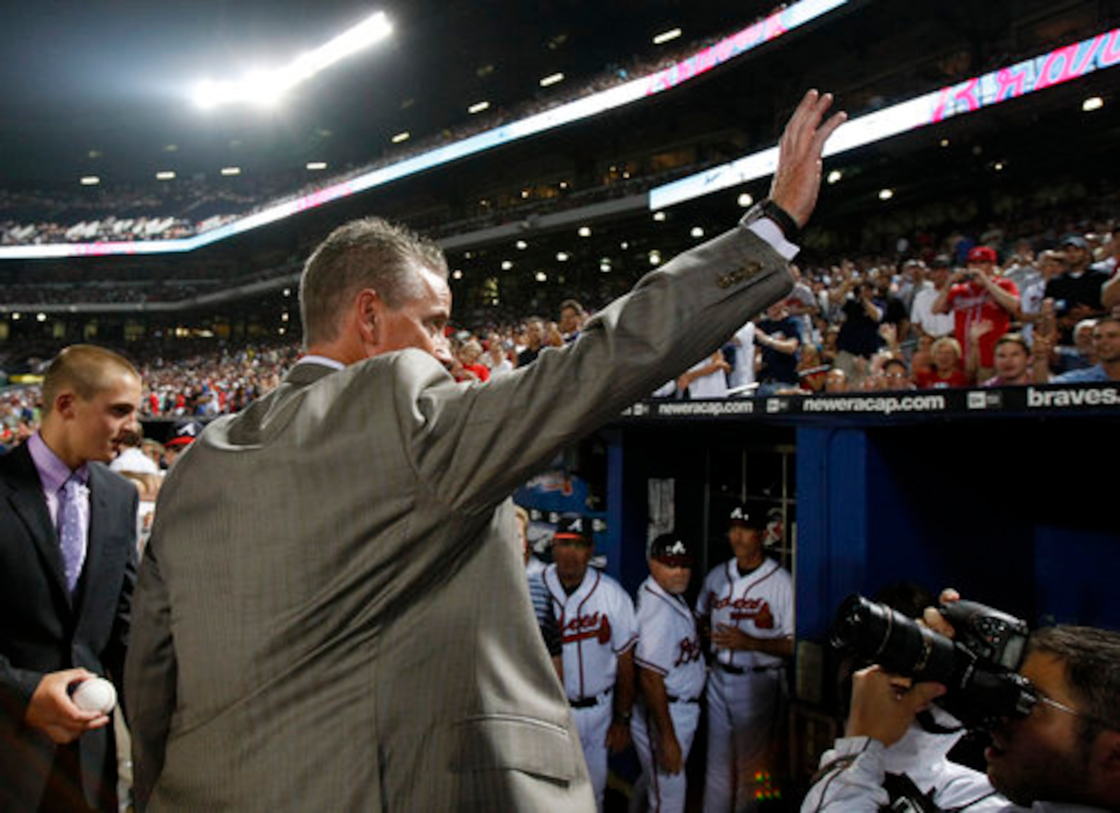 Tom Glavine waves to fans as he leaves the field after his uniform number is retired in a pre-game ceremony at Turner Field. Gavine's # 47 is the seventh Braves uniform number to be retired, joining Hank Aaron (44), Eddie Mathews (41), Dale Murphy (3), Phil Niekro (35), Warren Spahn (21), and Greg Maddux (31). Curtis Compton ccompton@ajc.com