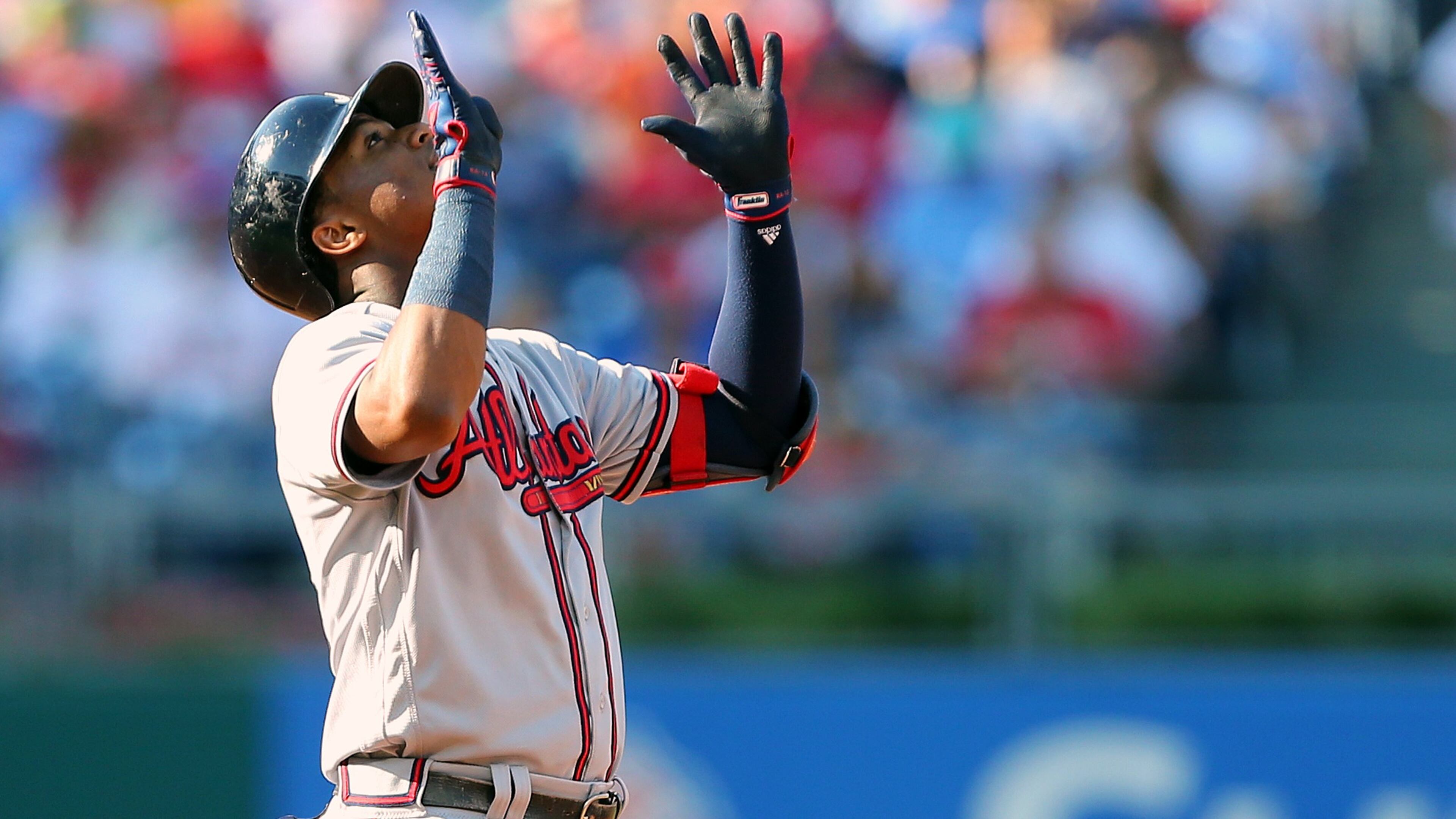 PHILADELPHIA, PA - SEPTEMBER 30: Ronald Acuna Jr. #13 of the Atlanta Braves gestures after hitting an RBI double against the Philadelphia Phillies during the third inning of a game at Citizens Bank Park on September 30, 2018 in Philadelphia, Pennsylvania. (Photo by Rich Schultz/Getty Images)