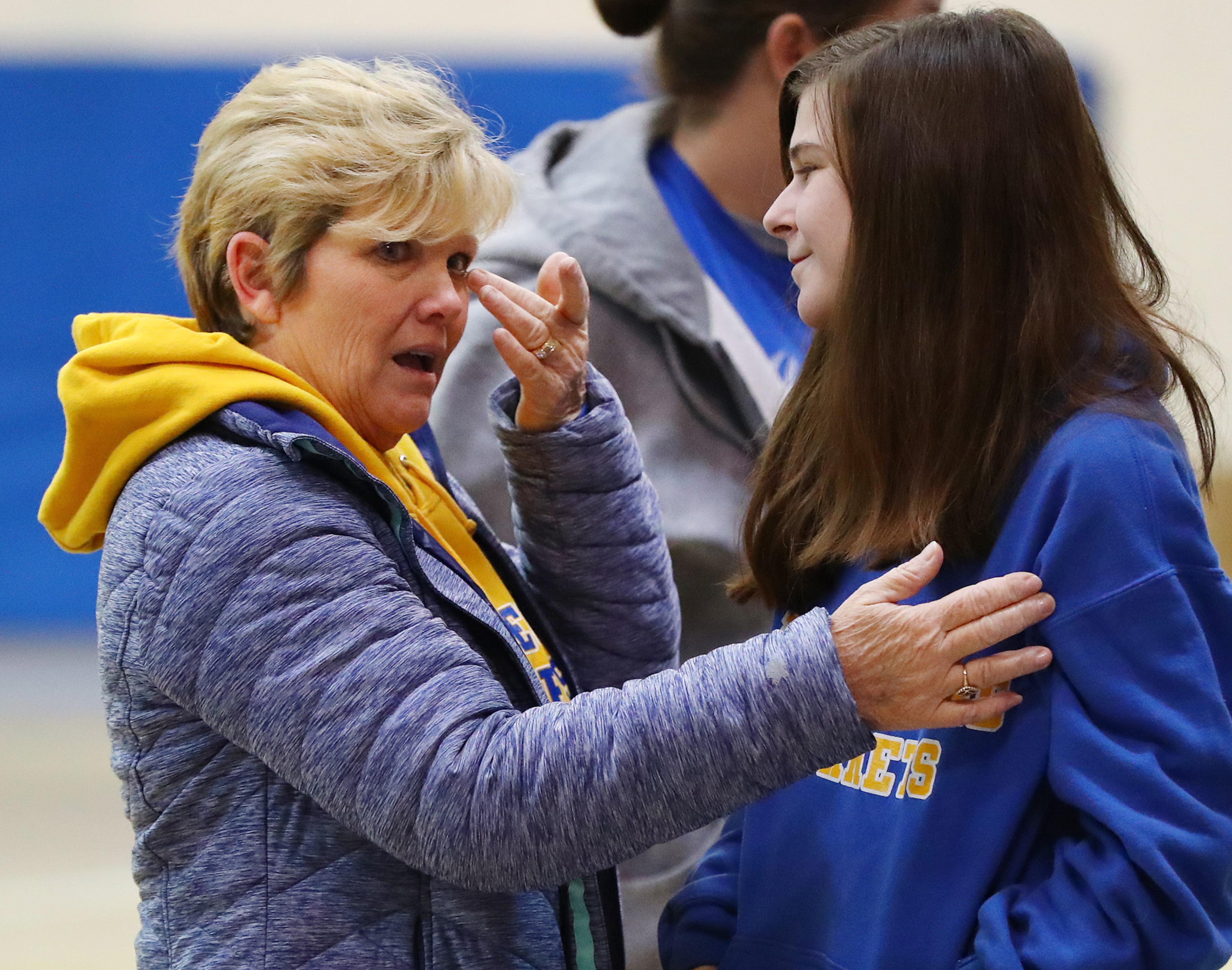 Beauregard High School paraprofessional Julie Howard and her former student Shania Nelson console each other during a prayer circle in the school gym for those in their community that lost their lives in a F-3 tornado on Monday, March 4, 2019, in Beauregard. Twenty-three people -- including a six-year-old -- were killed by a storm Sunday, though that number is expected to climb, Lee County Sheriff Jay Jones told reporters Monday morning. The destruction area is at least a half a mile wide and at least a mile long, he added. Curtis Compton/ccompton@ajc.com