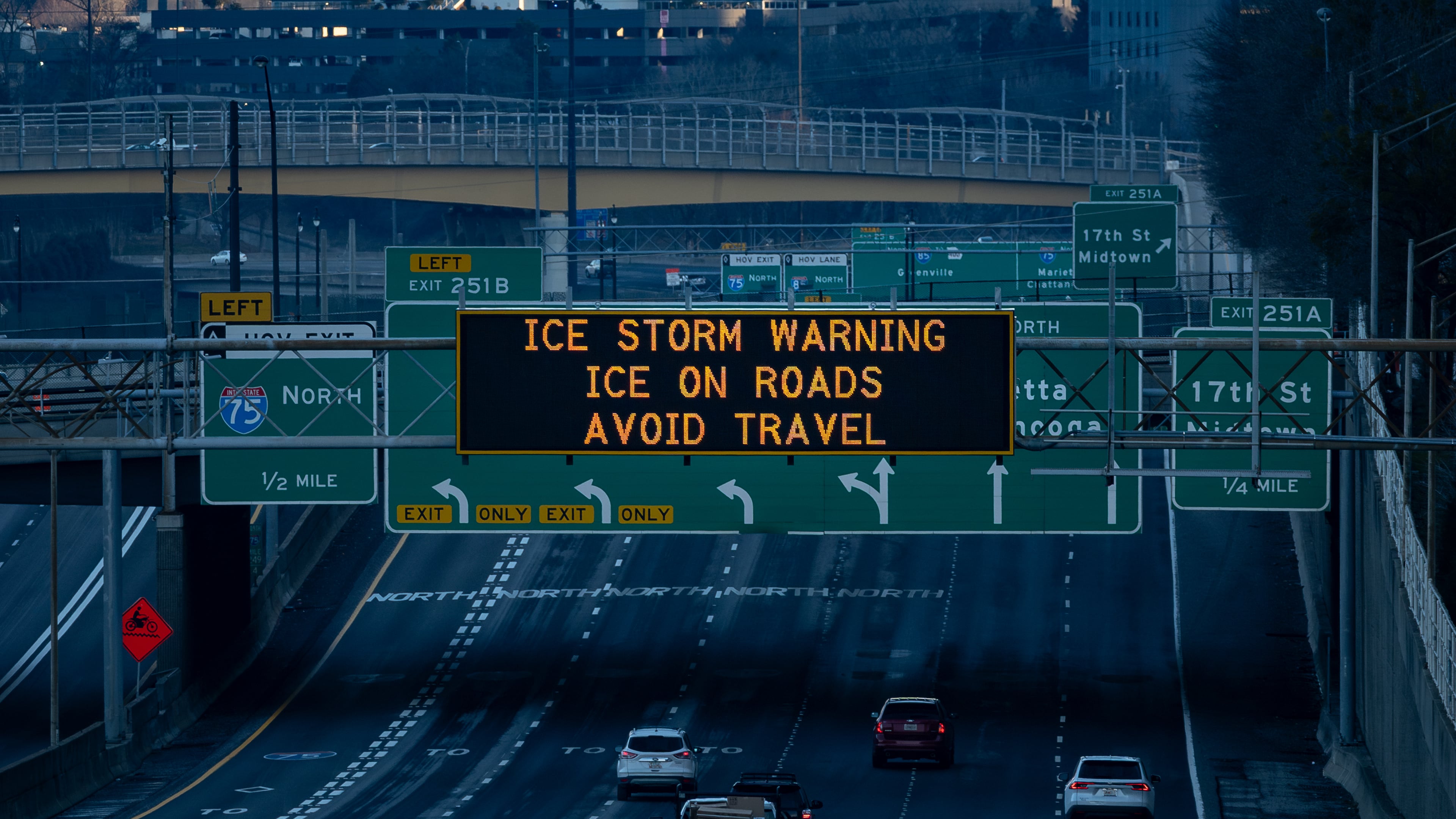 A Georgia Department of Transportation sign warns drivers of ice on roads during an ice storm warning in Atlanta, Georgia, Monday, Jan 26, 2026 (Ben Hendren for the AJC)