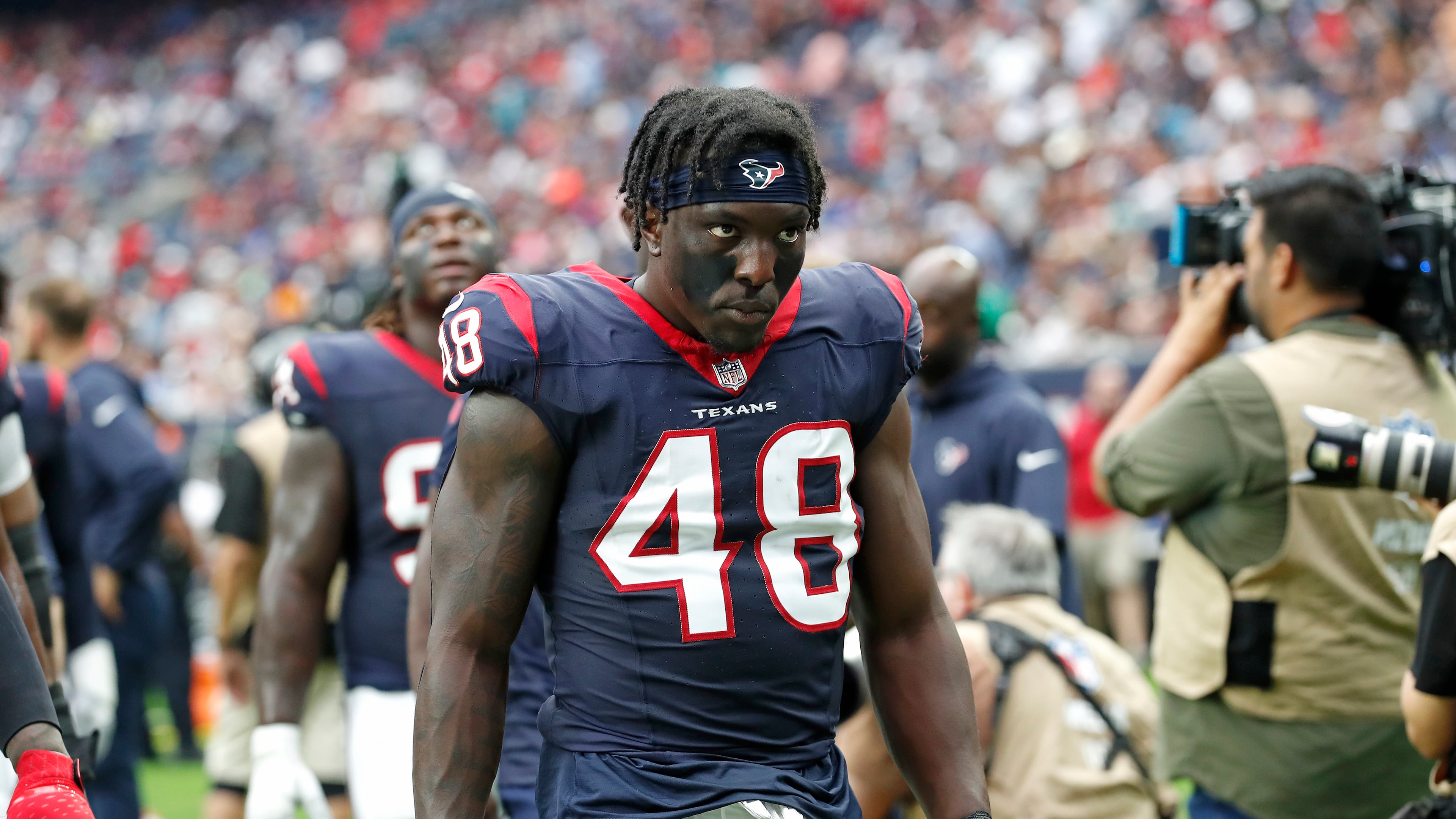 Linebacker Christian Harris, pictured during a 2023 preseason game in Houston, rues the way his time ended with the Texans but is optimistic about his chapter with the Falcons. (Tyler Kaufman/AP)