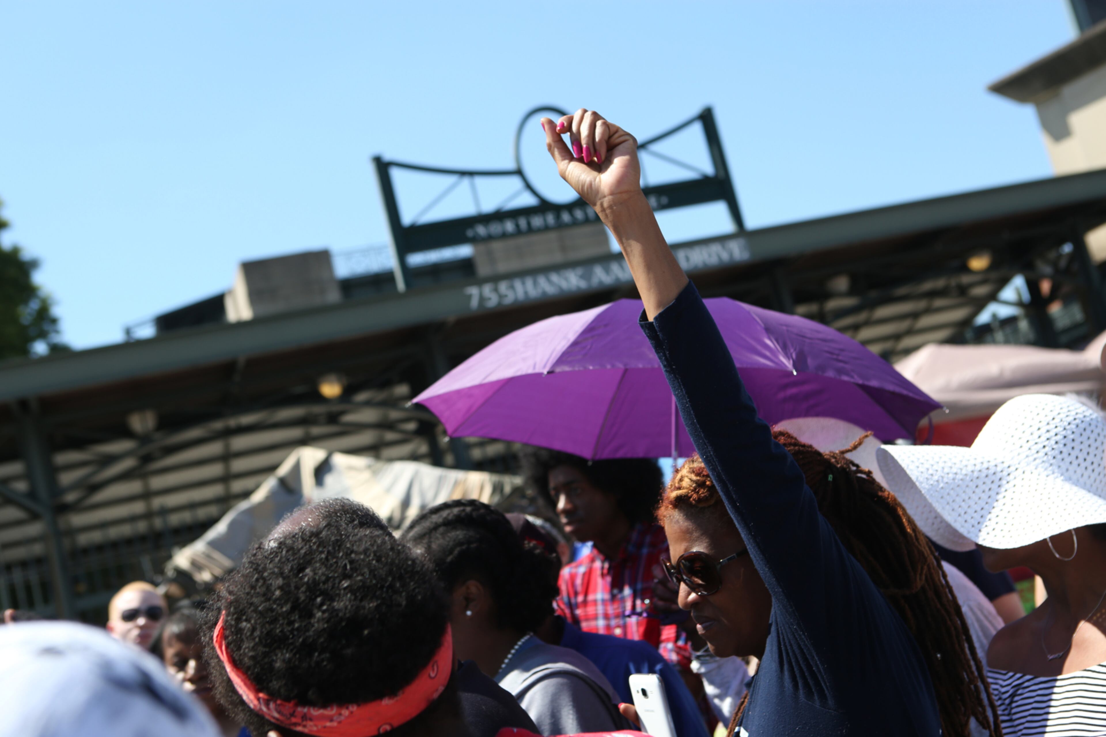 April 26, 2017, Atlanta, Georgia - Sherise Brown holds her hand up at a press conference held by neighborhood residents at Tent City in Atlanta, Georgia, on April 26, 2017. Protesters at Tent City Atlanta have camped out in front of Turner Field for nearly 20 days demanding a legally binding agreement that will state they will not be forced from their homes because of development. (HENRY TAYLOR / HENRY.TAYLOR@AJC.COM)