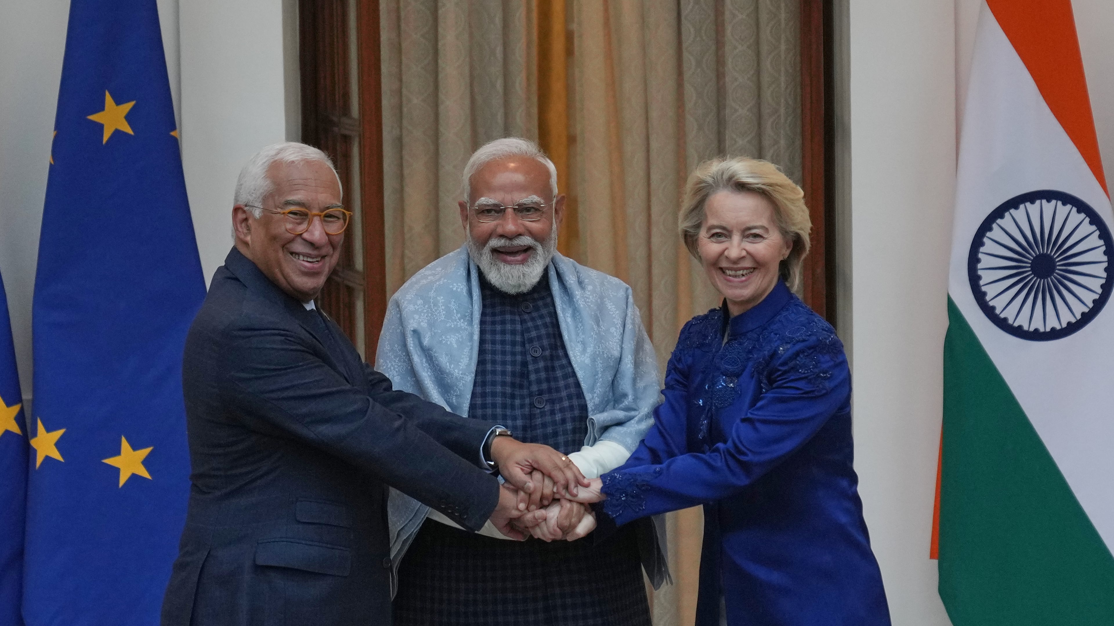 Indian Prime Minister Narendra Modi, center, welcomes European Council President Antonio Costa, left and European Commission President Ursula von der Leyen before their meeting in New Delhi, India, Tuesday, Jan. 27,2026. (AP Photo/Manish Swarup)