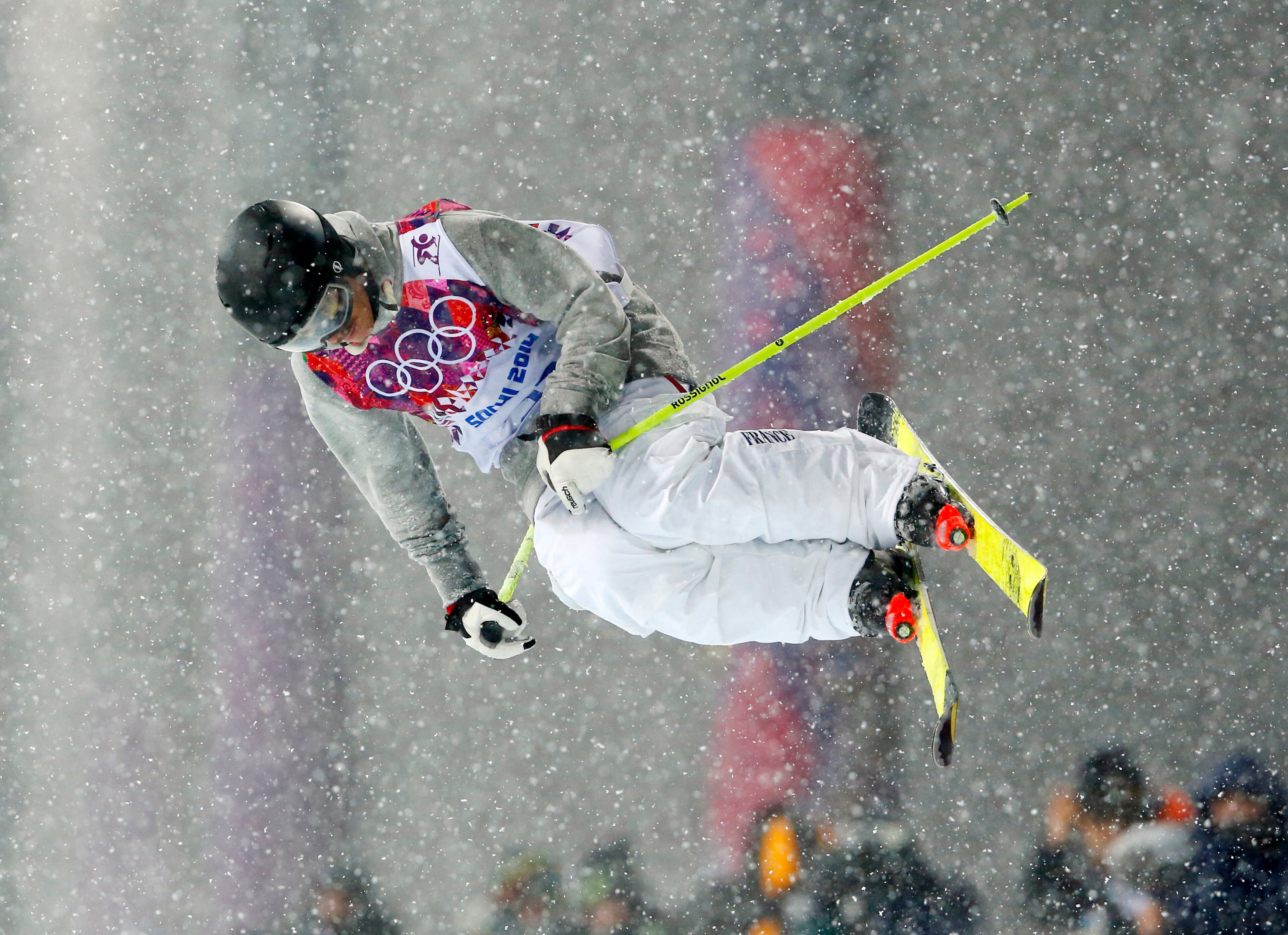 France's Benolt Valentin gets air during the men's ski halfpipe final at the Rosa Khutor Extreme Park, at the 2014 Winter Olympics, Tuesday, Feb. 18, 2014, in Krasnaya Polyana, Russia. (AP Photo/Sergei Grits)