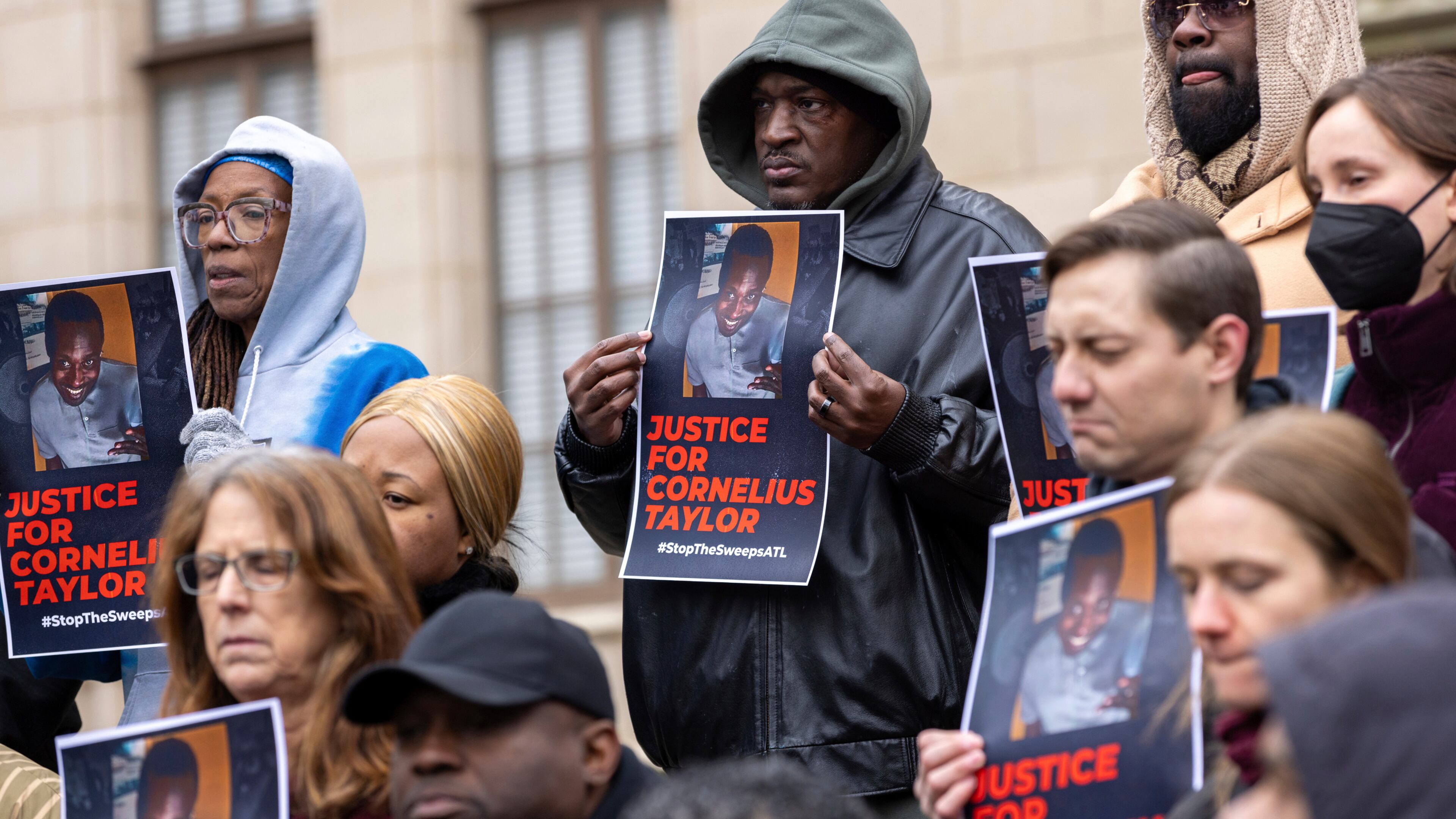 FILE - Family members and activists protest the death of Cornelius Taylor, an unhoused man killed when the city cleared an encampment last week, in front of City Hall in Atlanta, Jan. 23, 2025. (Arvin Temkar/Atlanta Journal-Constitution via AP, File)