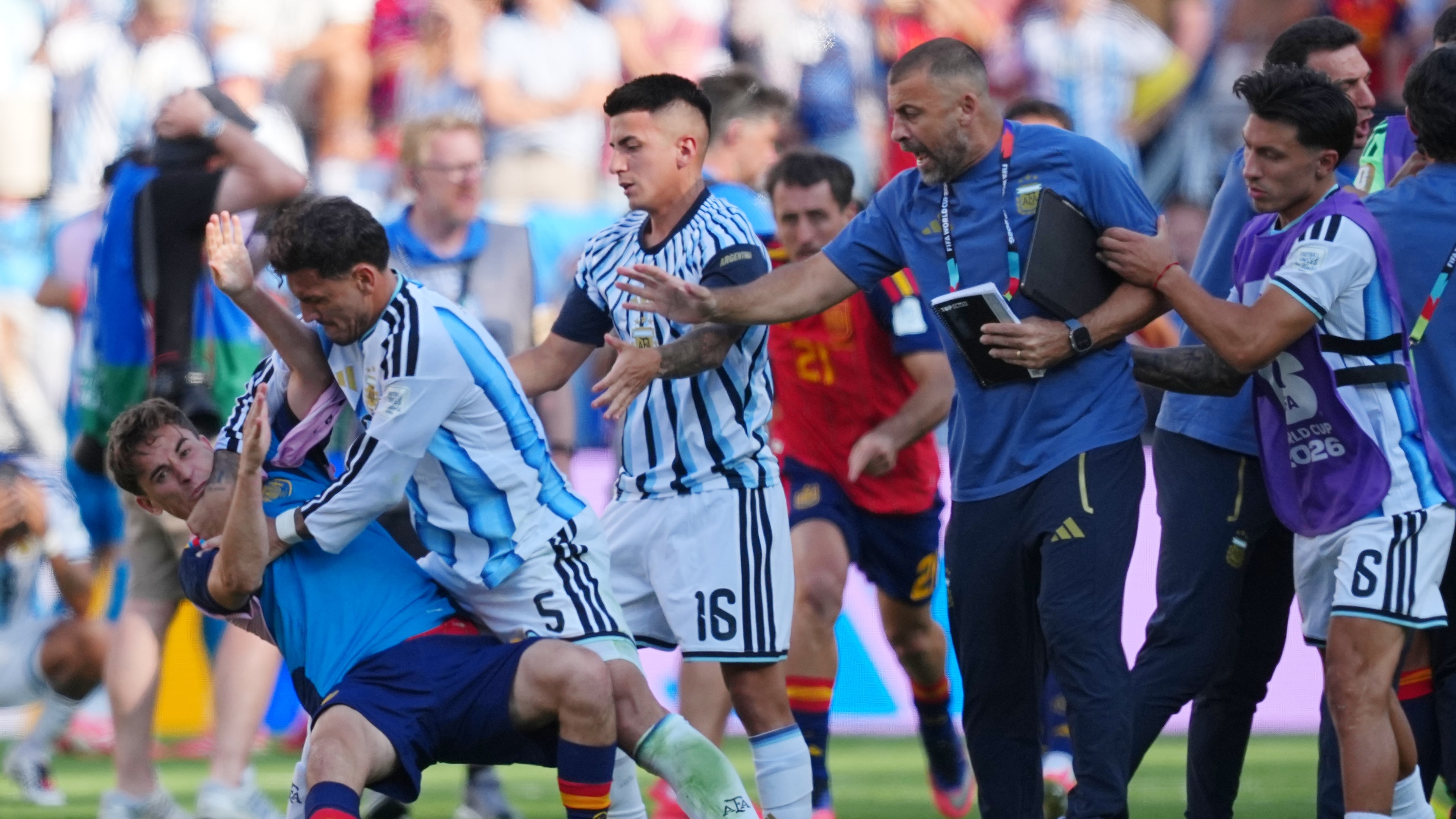 FILE - Argentina's Leandro Paredes (5) knocks down Spain's Gavi (9) during scuffle after the World Cup final soccer match between Spain and Argentina in East Rutherford, N.J., near New York, Sunday, July 19, 2026. (AP Photo/Julio Cortez, File)