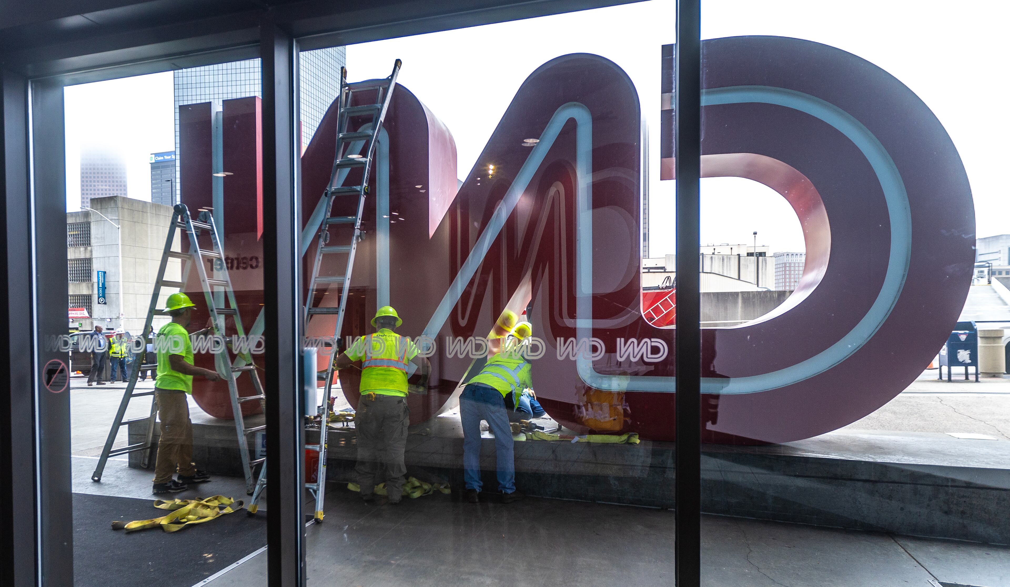 The CNN sign in front of the CNN Center along Centennial Olympic Park Drive in downtown Atlanta was dismantled and moved to Turner Broadcasting on Monday, March, 4, 2024. (John Spink / John.Spink@ajc.com)
