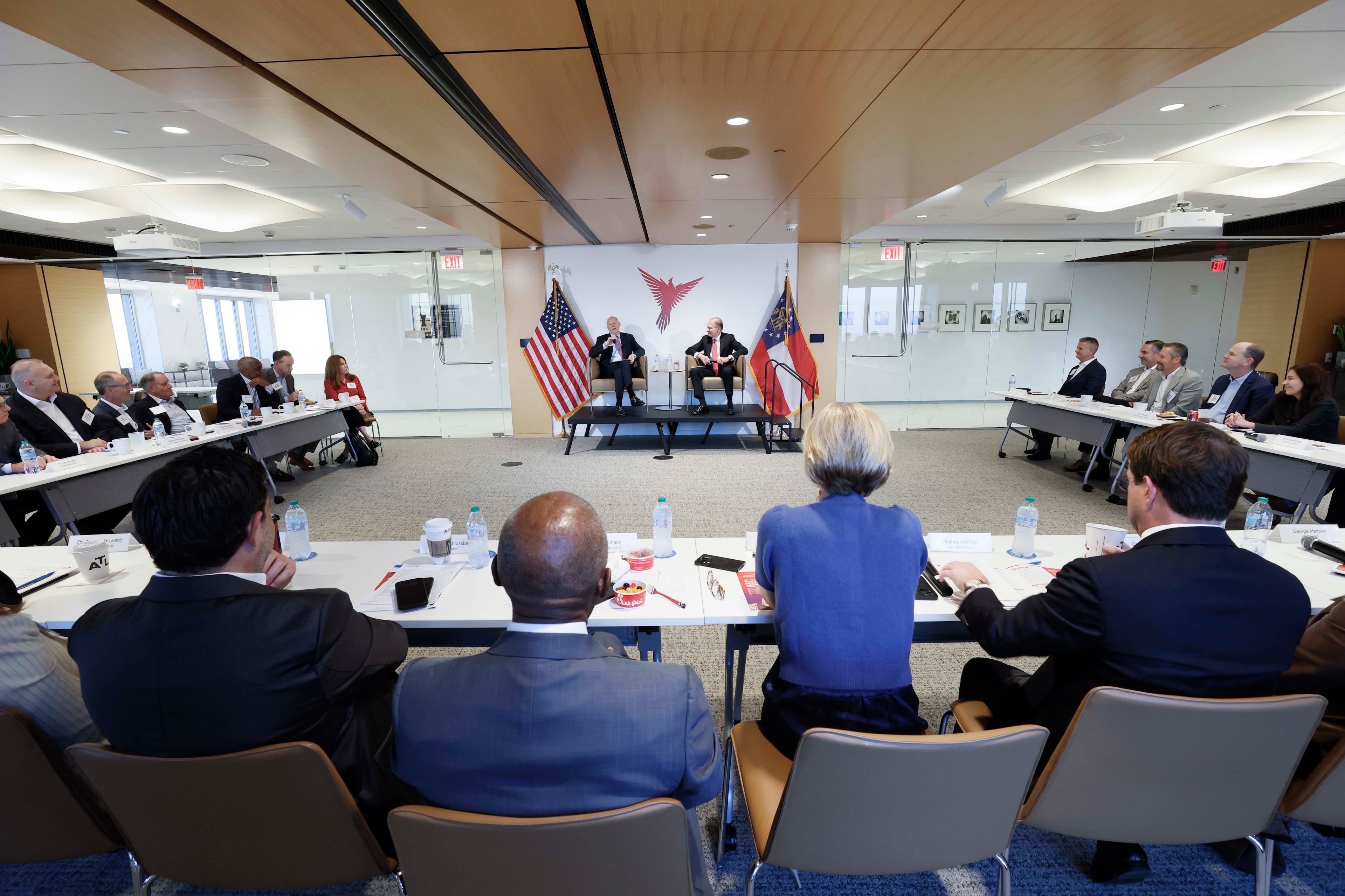 SEC Chairman Paul Atkins (center, right) and Intercontinental Exchange Chairman & CEO Jeffrey Sprecher speak with attendees during a fireside chat at the Metro Atlanta Chamber on Thursday, Oct. 15, 2026. (Miguel Martinez/AJC)