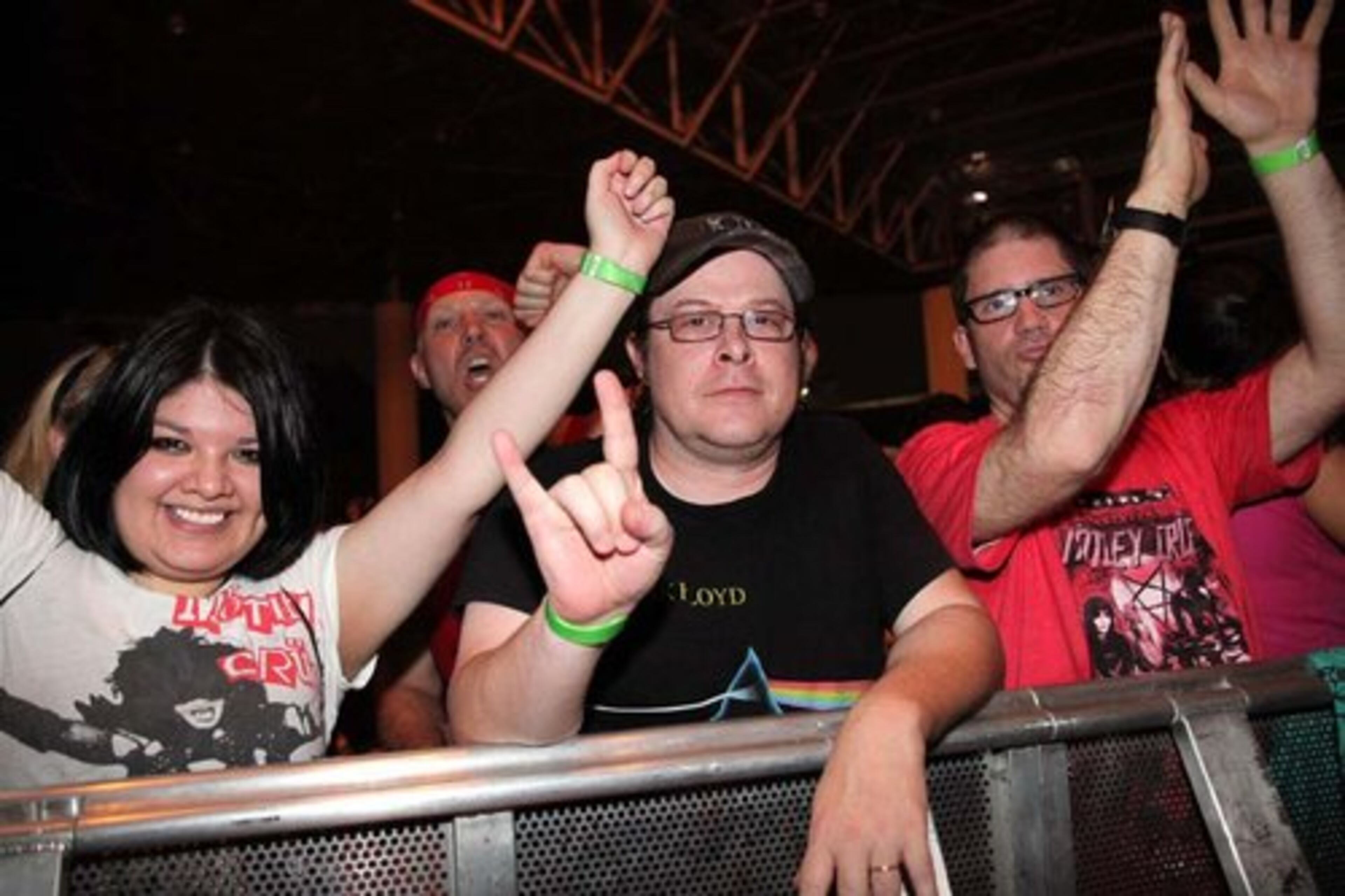 Some of the fans in the front row to watch Vince Neil and Motley Crue performing.