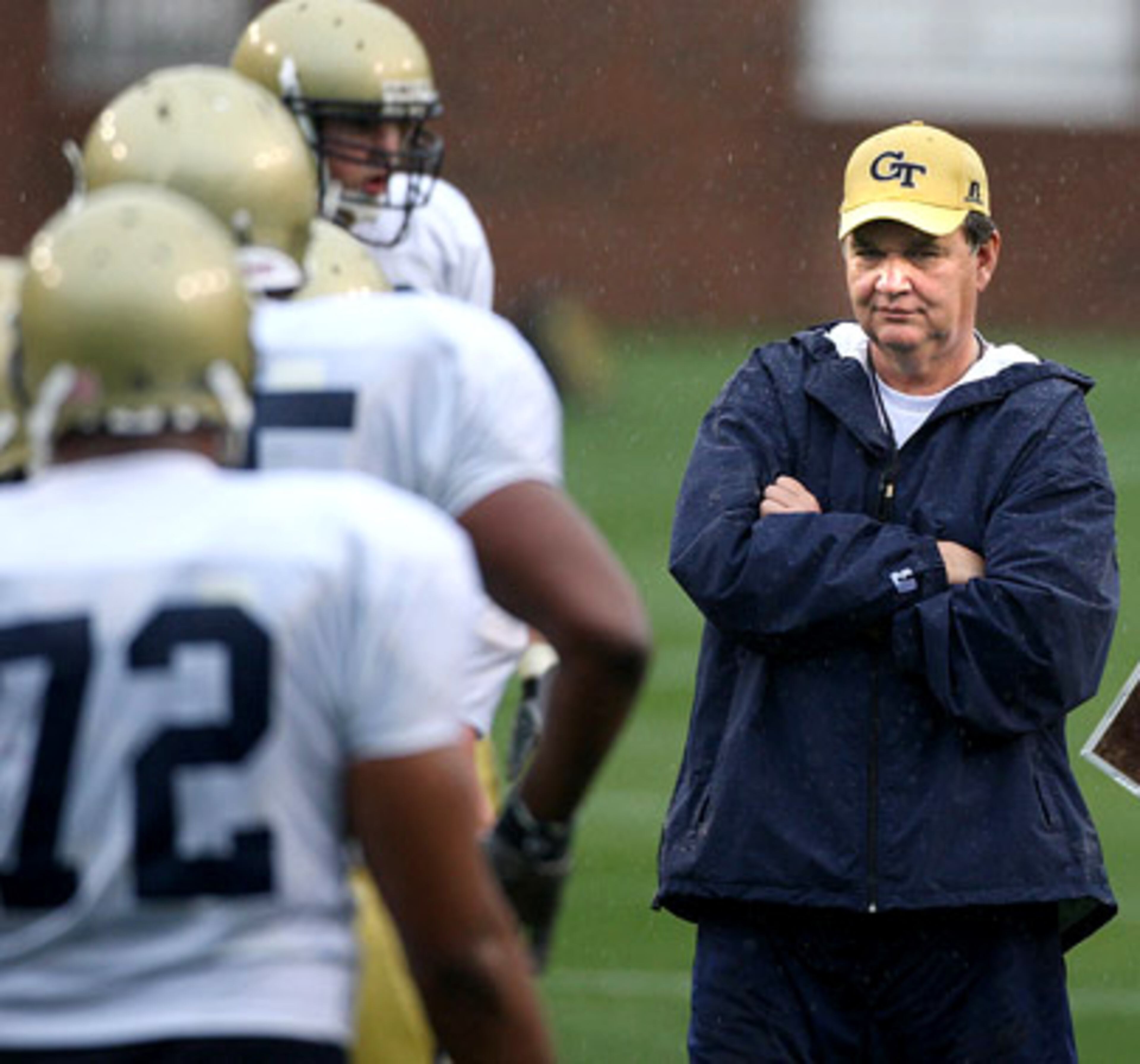 Under a heavy mist and the watchful eye of new coach Paul Johnson, the Yellow Jackets took part in theri second scrimmage of the spring. Tech players committed 14 fumbles on 130 plays. "We haven't done a very good job coaching them if they don't know what they're doing," he said.