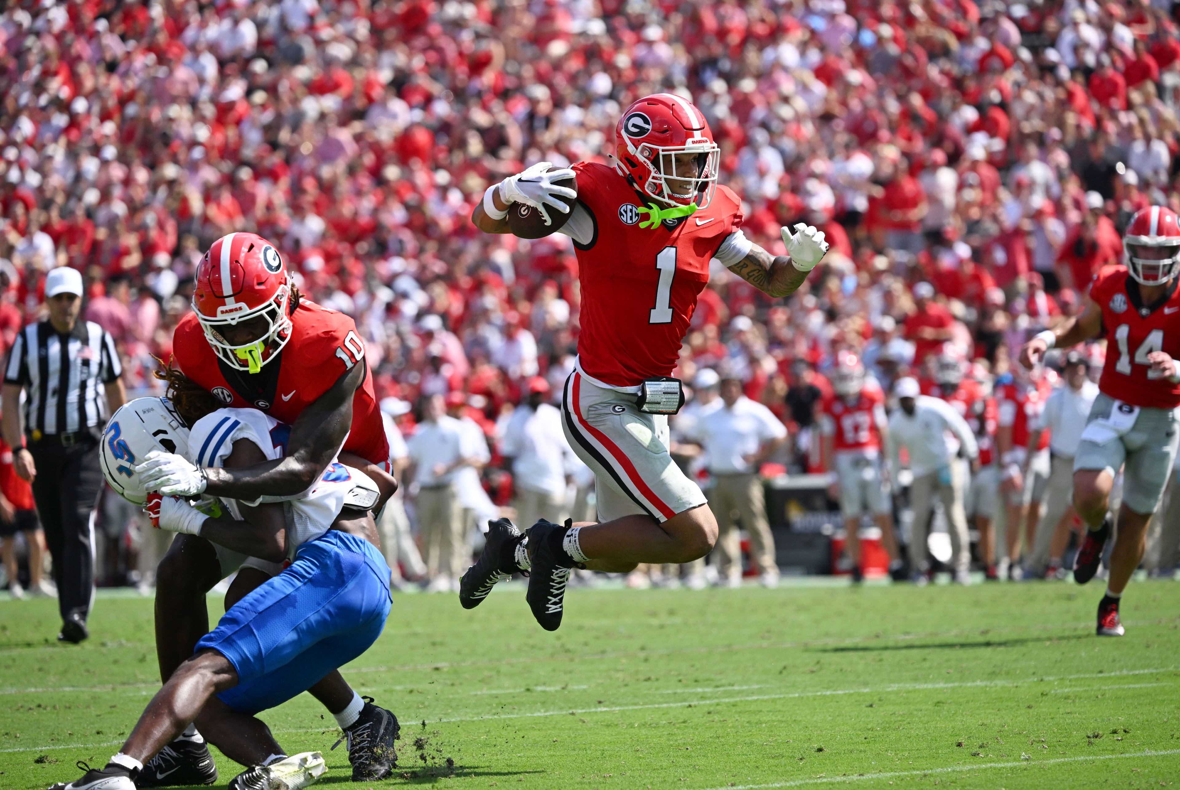 Georgia wide receiver Talyn Taylor runs for a touchdown during the first half in an NCAA football game vs. Tennessee State at Sanford Stadium on Saturday, Sept. 5, 2026, in Athens, Ga. (Hyosub Shin/AJC)