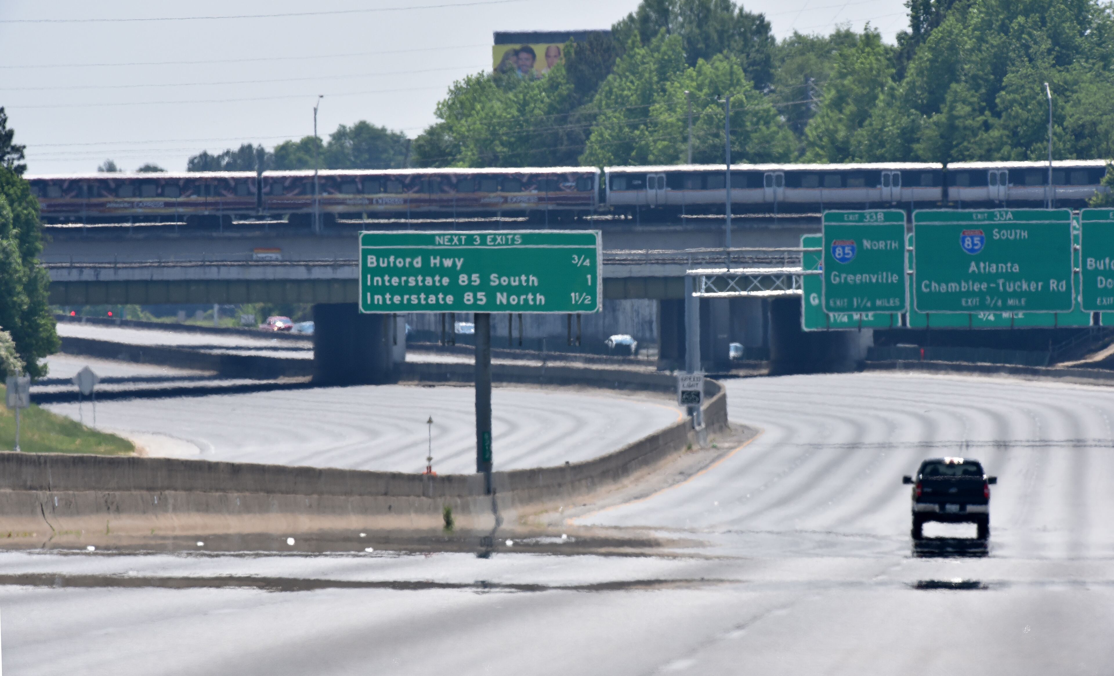 May 8, 2015 Atlanta - Four people died aboard a small plane Friday, May 8, 2015 after it crashed Friday morning on I-285 at Peachtree Industrial Boulevard. Traffic was shut down in both directions. The National Transportation Safety Board is in charge of the investigation and will determine probable cause. HYOSUB SHIN / HSHIN@AJC.COM