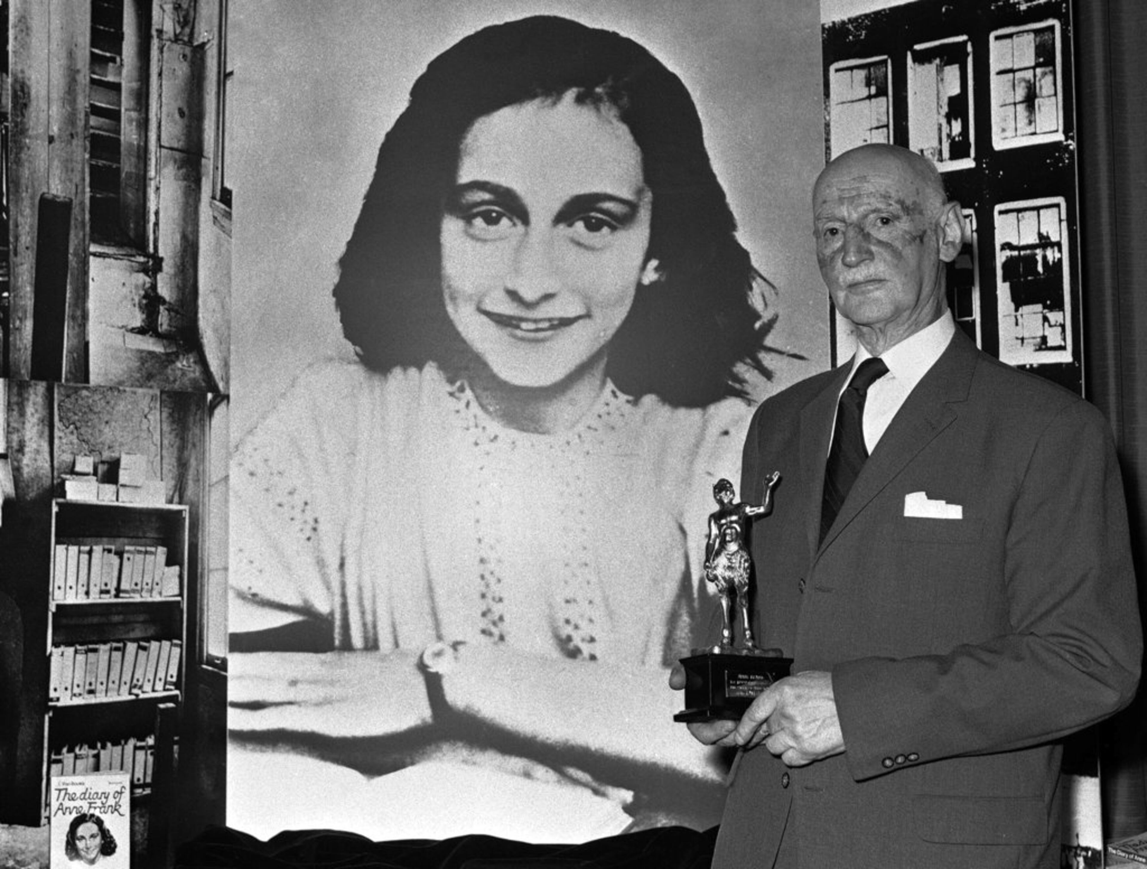 FILE - In this Monday, June 14, 1971 photo Dr. Otto Frank holds the Golden Pan award, given for the sale of one million copies of the famous paperback 'The Diary of Anne Frank' in London, Great Britain. New research suggests that the family of Anne Frank, the world-famous Jewish diarist who died in the Holocaust, attempted to immigrate to the United States and later also to Cuba, but their efforts were tragically thwarted by Americaâs restrictive immigration policy, cumbersome bureaucracy and the outbreak of World War II. Only Otto Frank survived the holocaust. (AP Photo/Dave Caulkin, file)