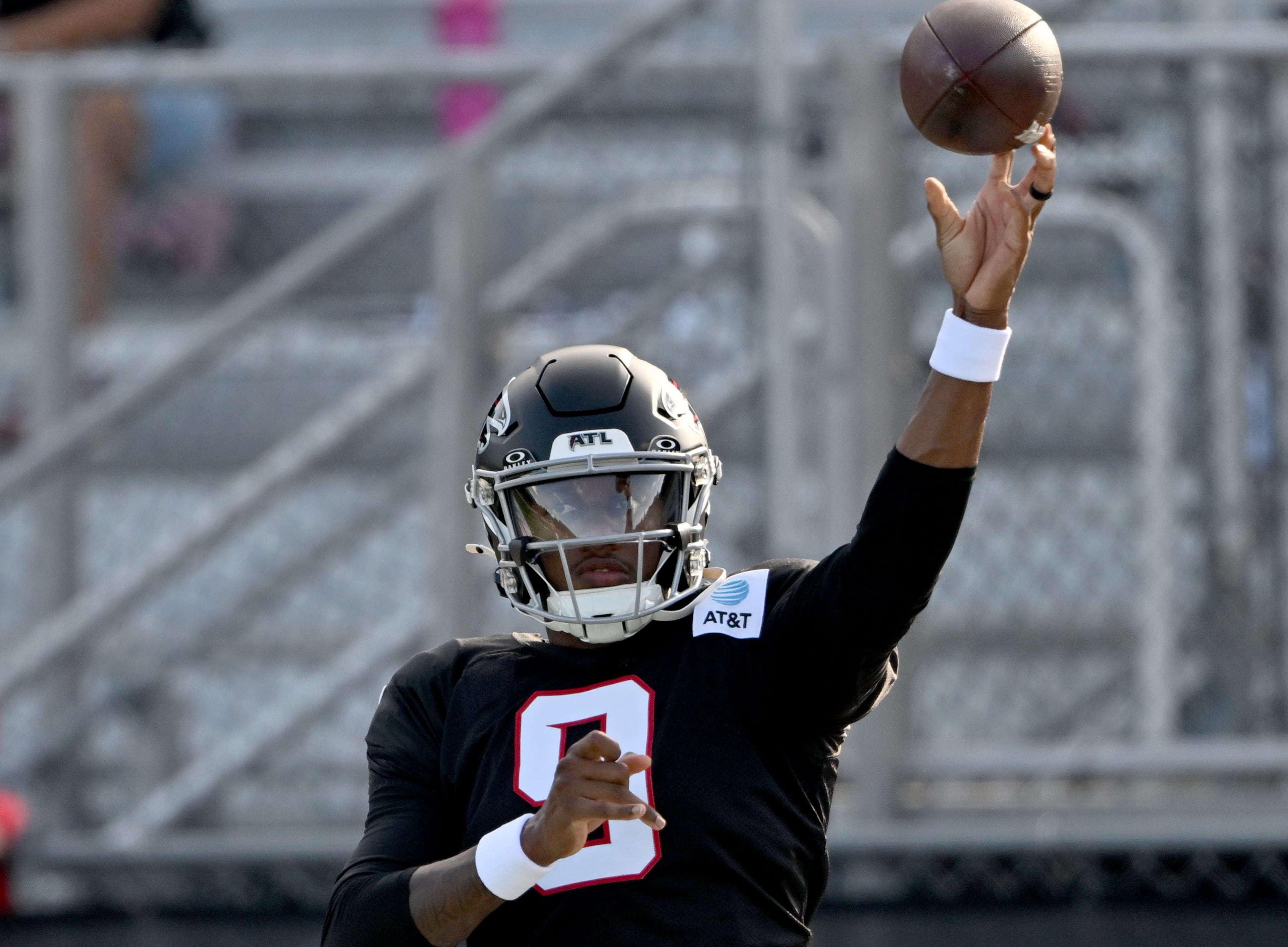 Falcons quarterback Michael Penix Jr. throws during "Saturday Night Lights" practice Saturday, Aug. 8, 2026, at Lanier High School in Sugar Hill. (Hyosub Shin/AJC)