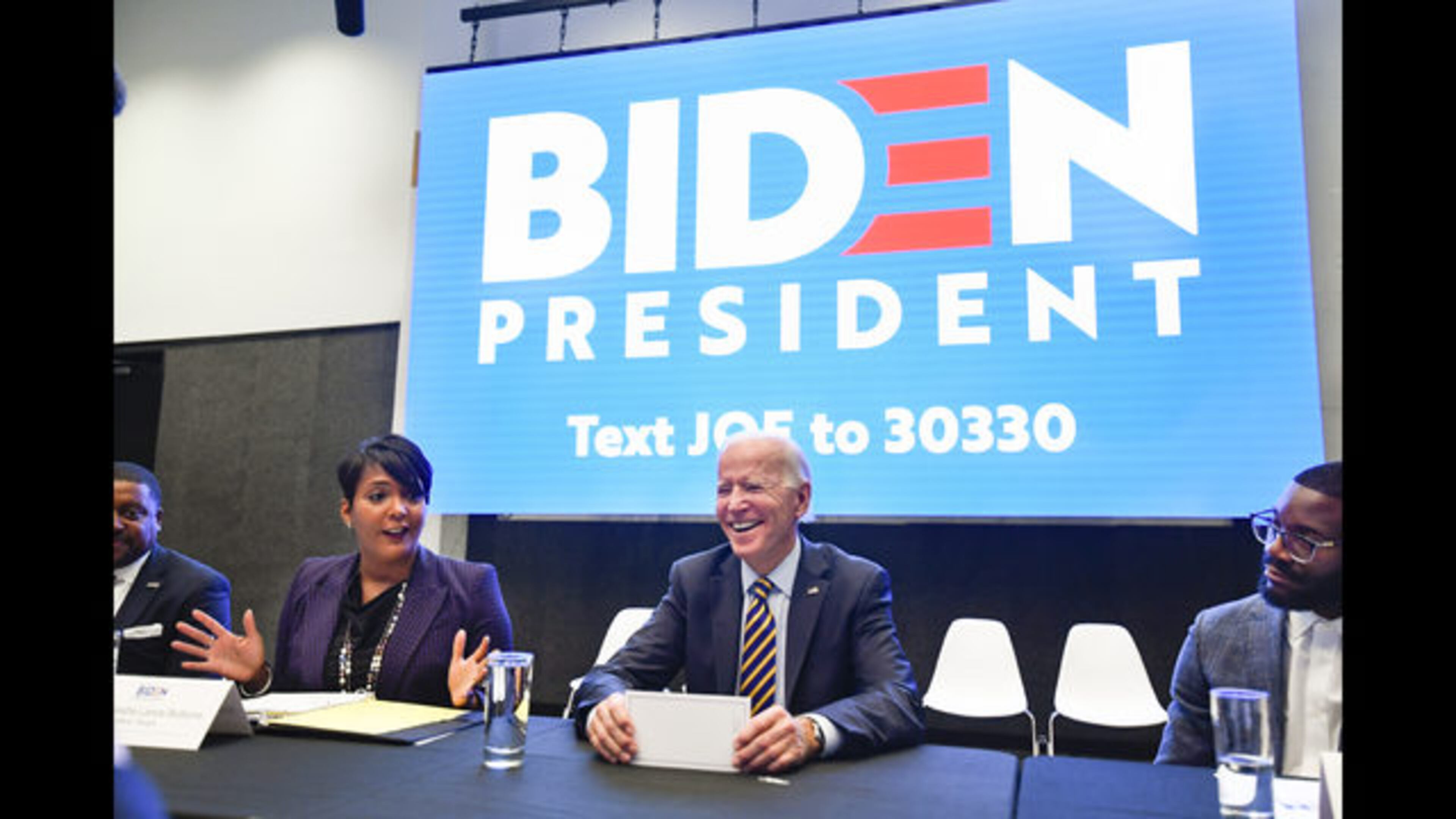 Former U.S. Vice President and 2020 Democratic presidential candidate Joe Biden reacts as he is introduced by Atlanta mayor Keisha Lance Bottoms during an assembly of Southern black mayors Thursday, Nov. 21, 2019 in Atlanta. (AP Photo/John Amis)