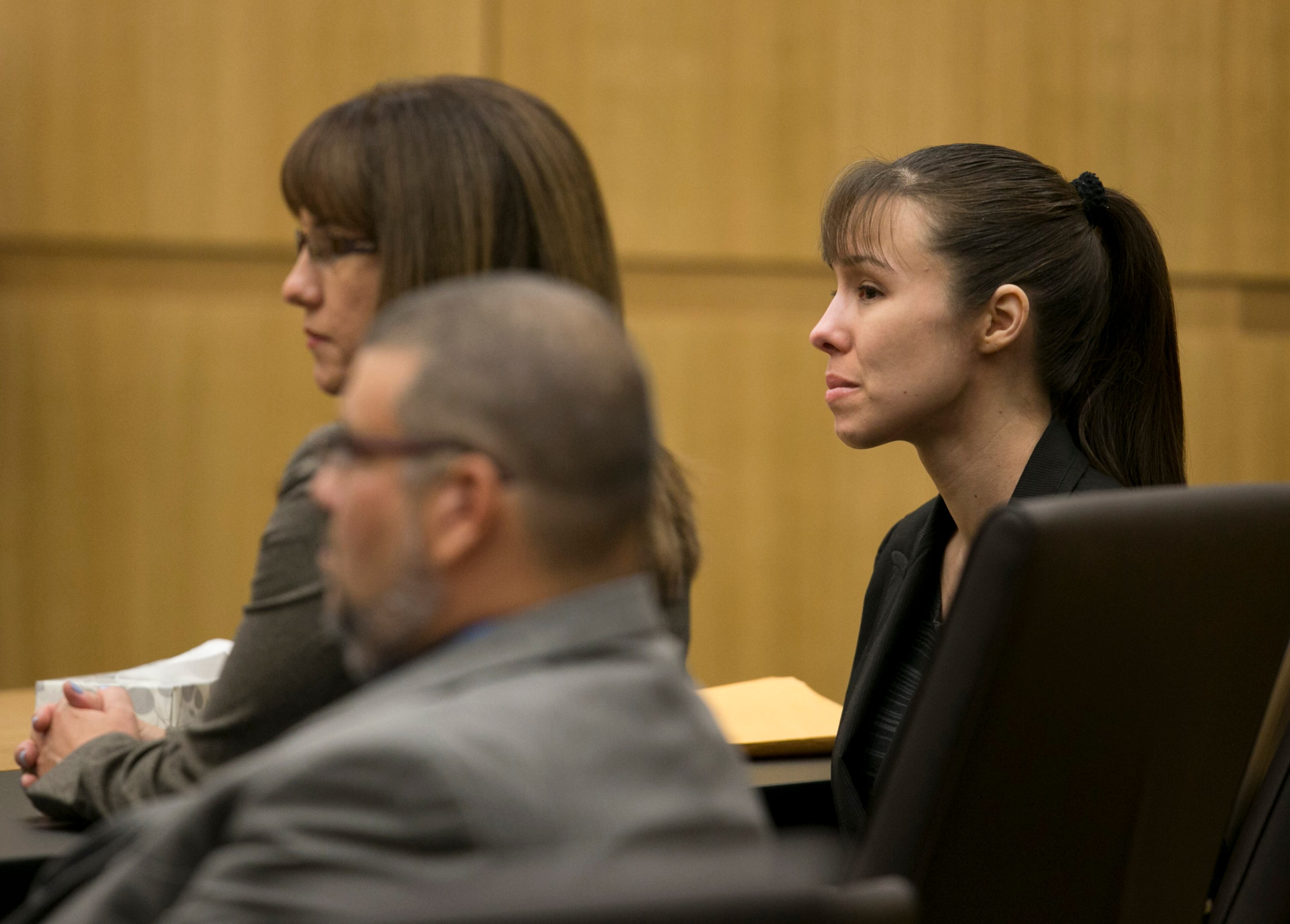 Jodi Arias listens as the verdict for sentencing is read for her first-degree murder conviction at Maricopa County Superior Court in Phoenix, Ariz., on Thursday, May 23, 2013. The jury convicted her of murdering her one-time boyfriend in a case that captured headlines worldwide with its sex, lies, violence.