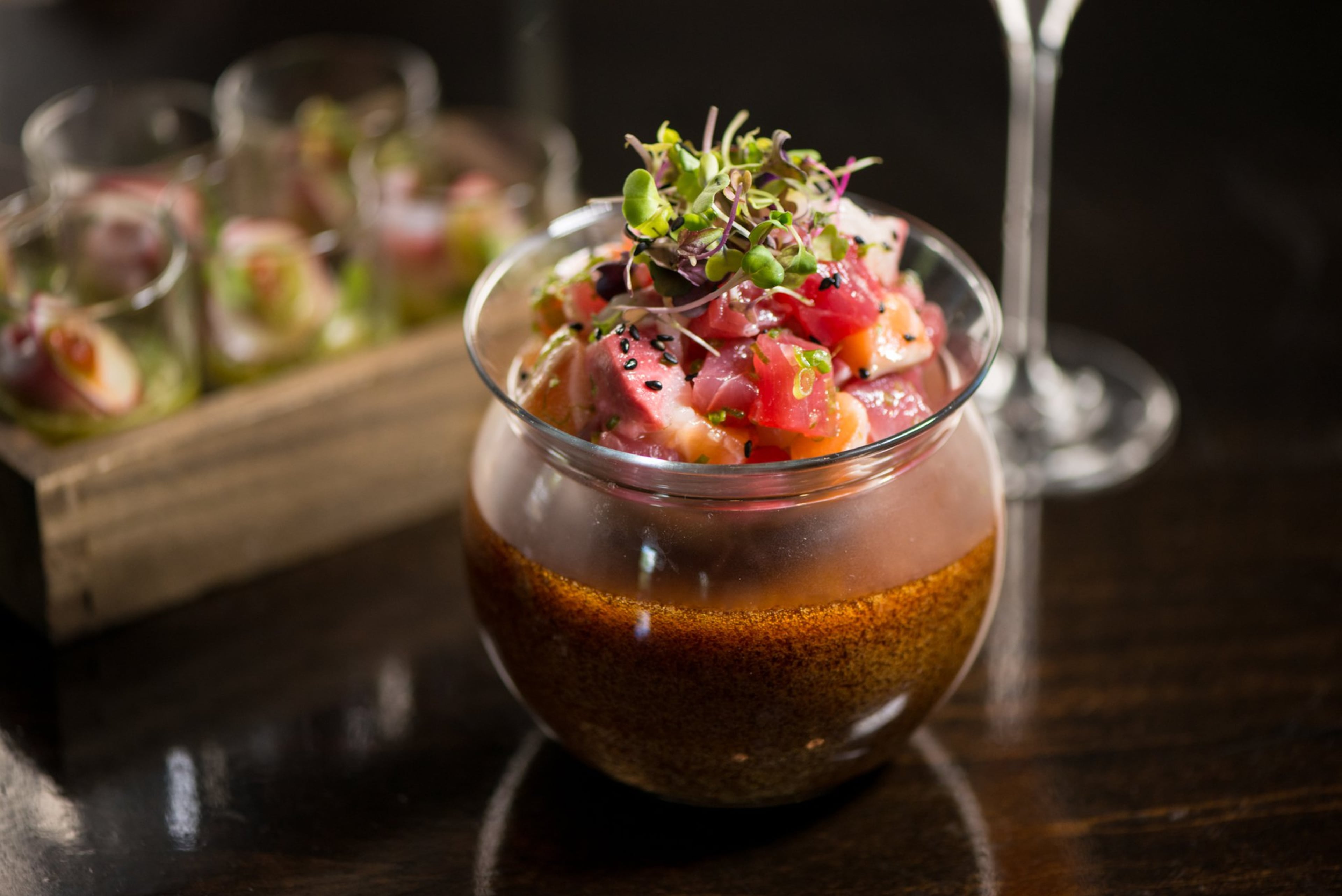 Pokitini with tuna, salmon, yellowtail, olive oil, sea salt, and soy foam. Photo credit- Mia Yakel.