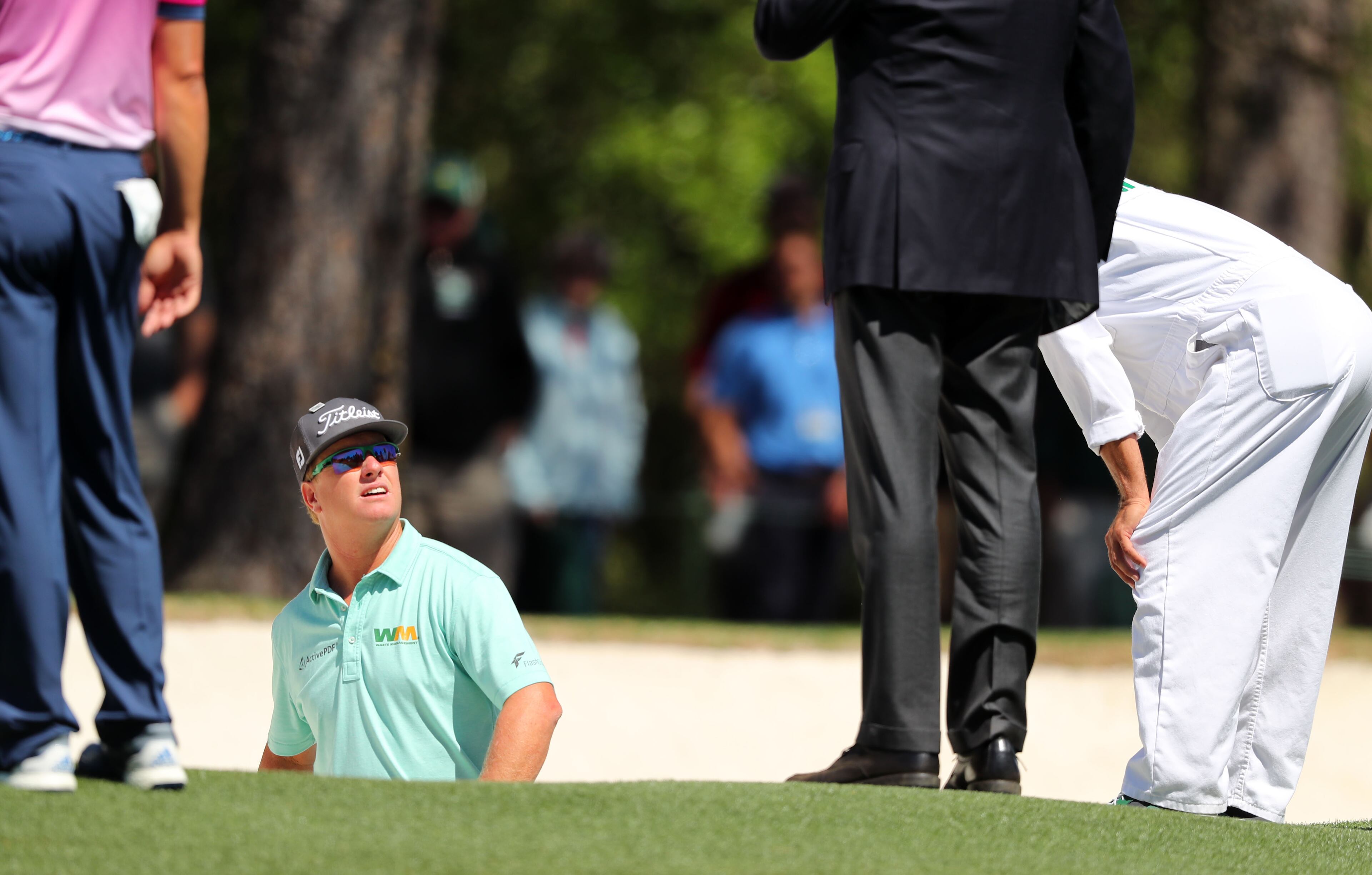 April 8, 2017 AUGUSTA Charley Hoffman gets a ruling before he hits from a bunker on the 1st hole. Play begins in the third round of the 81st Masters tournament at the Augusta National Golf Club, Saturday, April 8, 2017. CURTIS COMPTON/ AJC