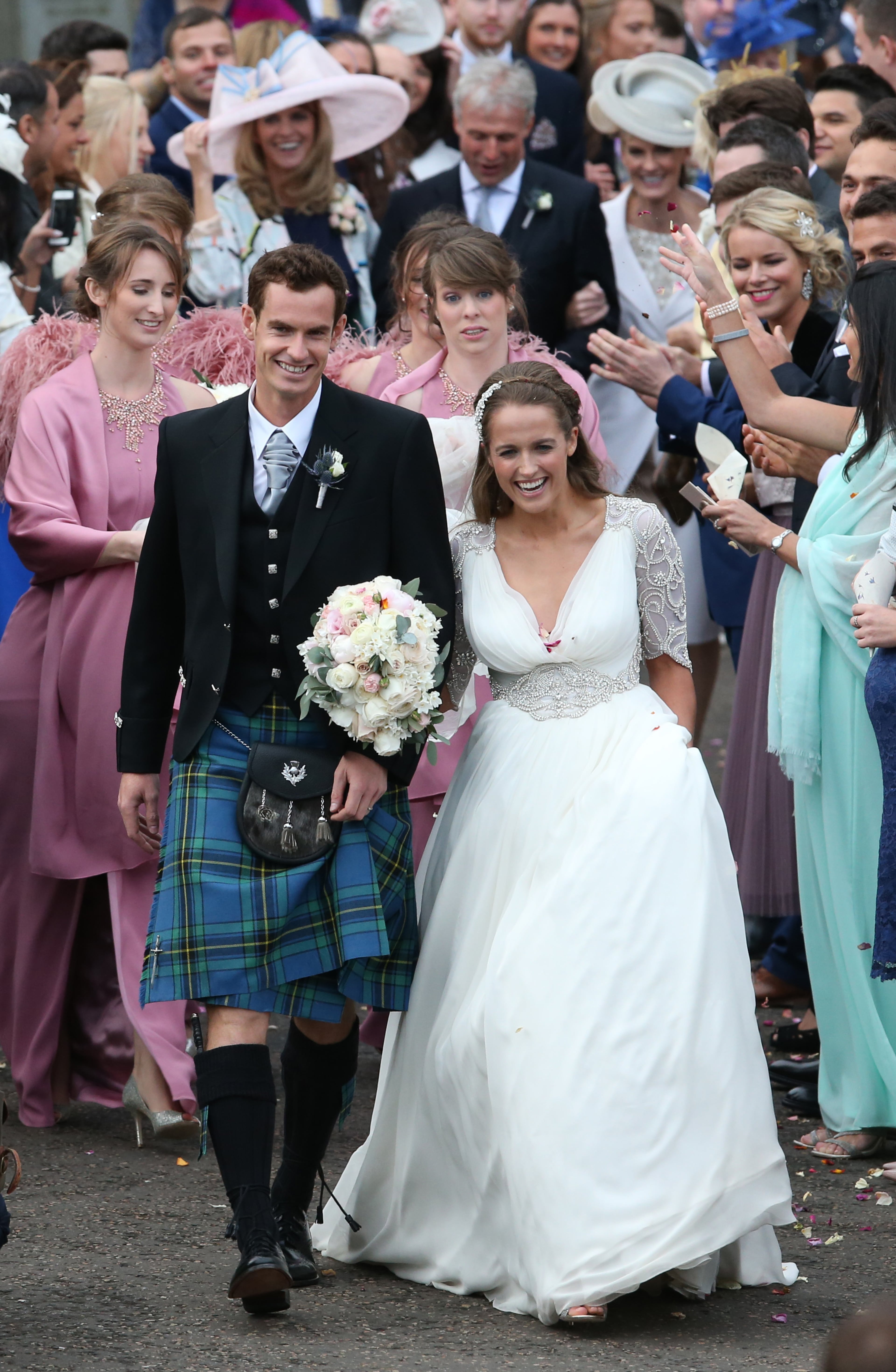 Britain's Andy Murray and Kim Sears leave Dunblane Cathedral in Scotland after their wedding, Saturday April 11, 2015. (AP Photo/PA, Andrew Milligan) UNITED KINGDOM OUT NO SALES NO ARCHIVE