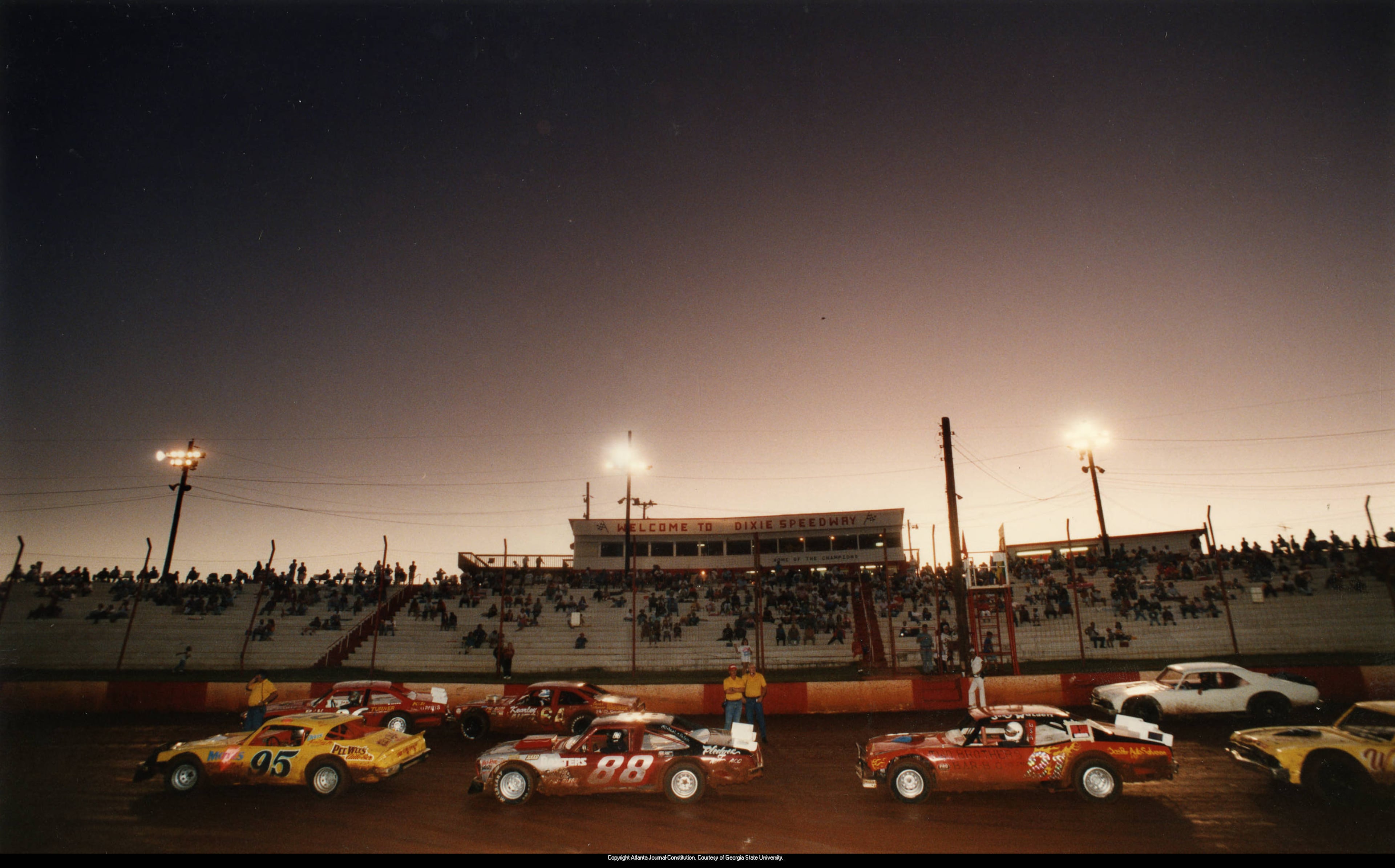 Race car drivers rev their engines at the Dixie Speedway, 1993. Erik S. Lesser / AJC file