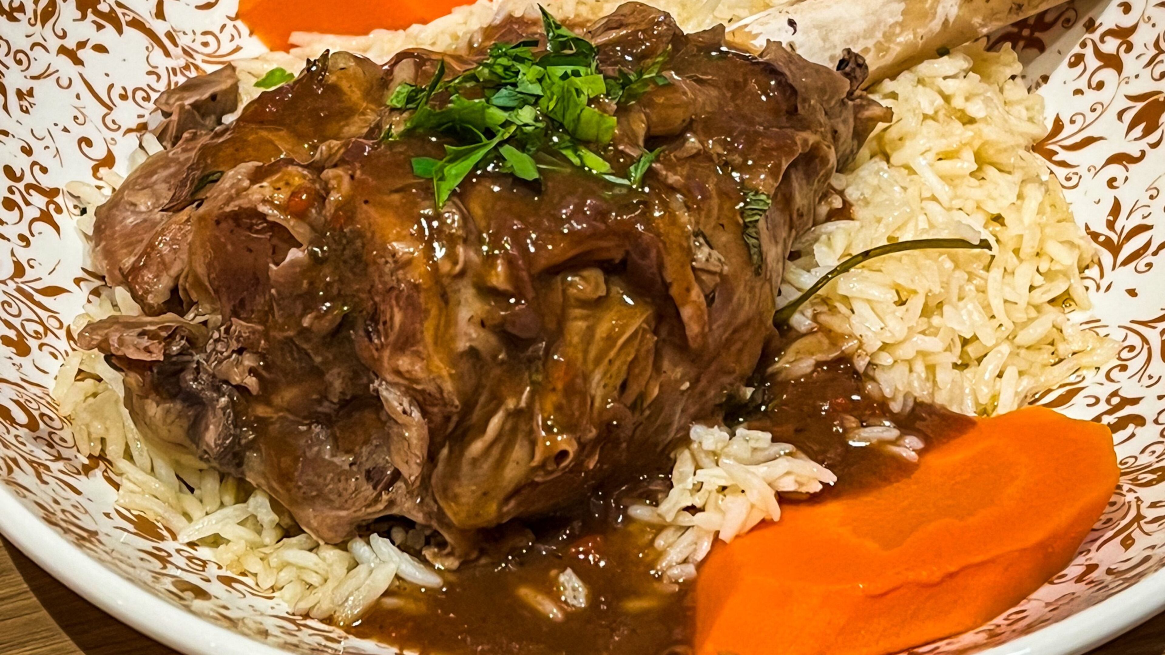 A serving of lamb shank was fork-tender at Raik Mediterranean in Suwanee. (Henri Hollis/henri.hollis@ajc.com)
