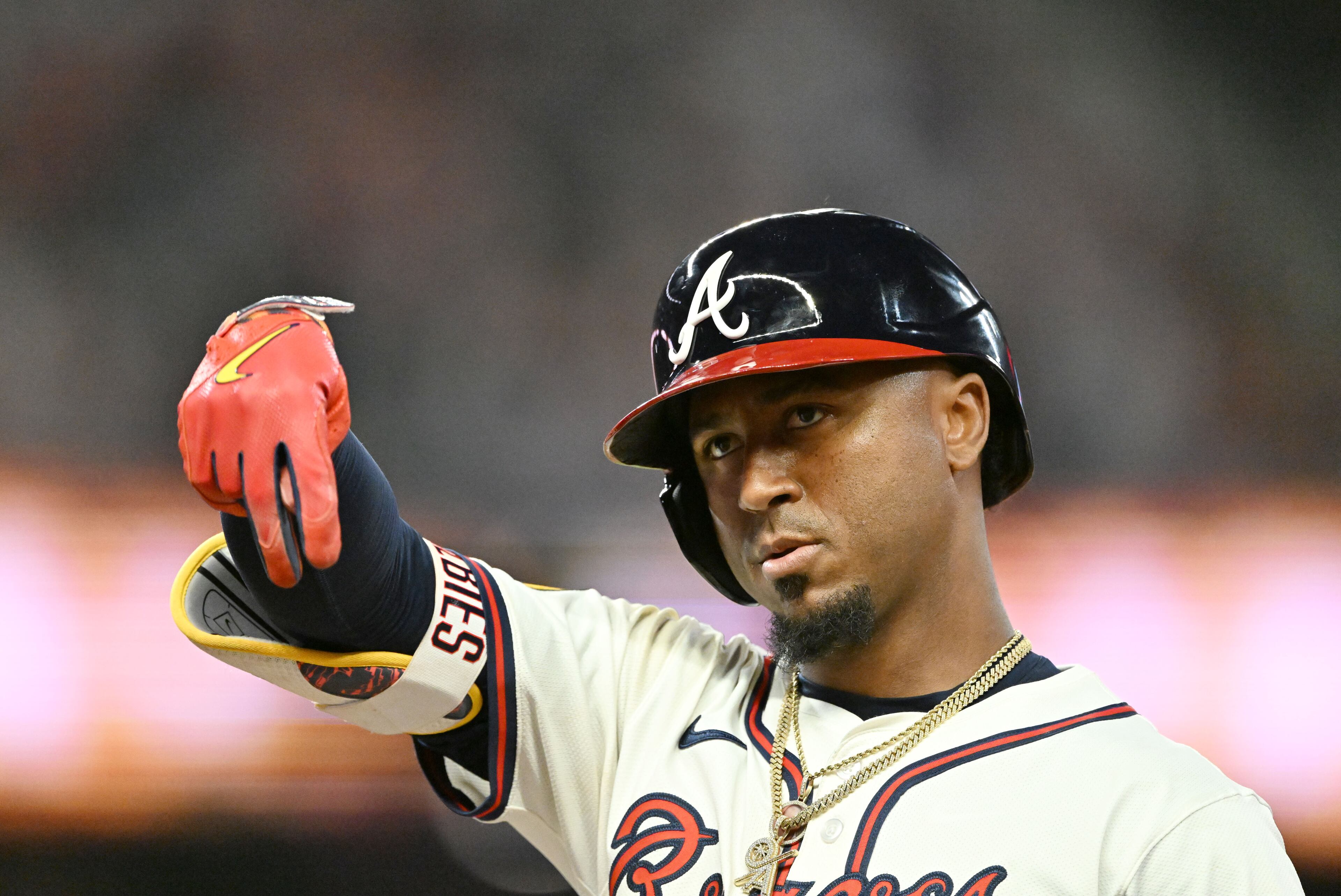 Atlanta Braves second base Ozzie Albies (1) reacts after hitting an RBI single to score Atlanta Braves shortstop Nick Allen during the eighth inning of home opener baseball game at Truist Park, Friday, April 4, 2025, in Atlanta. Atlanta Braves won 10-0 over Miami Marlins. (Hyosub Shin / AJC)