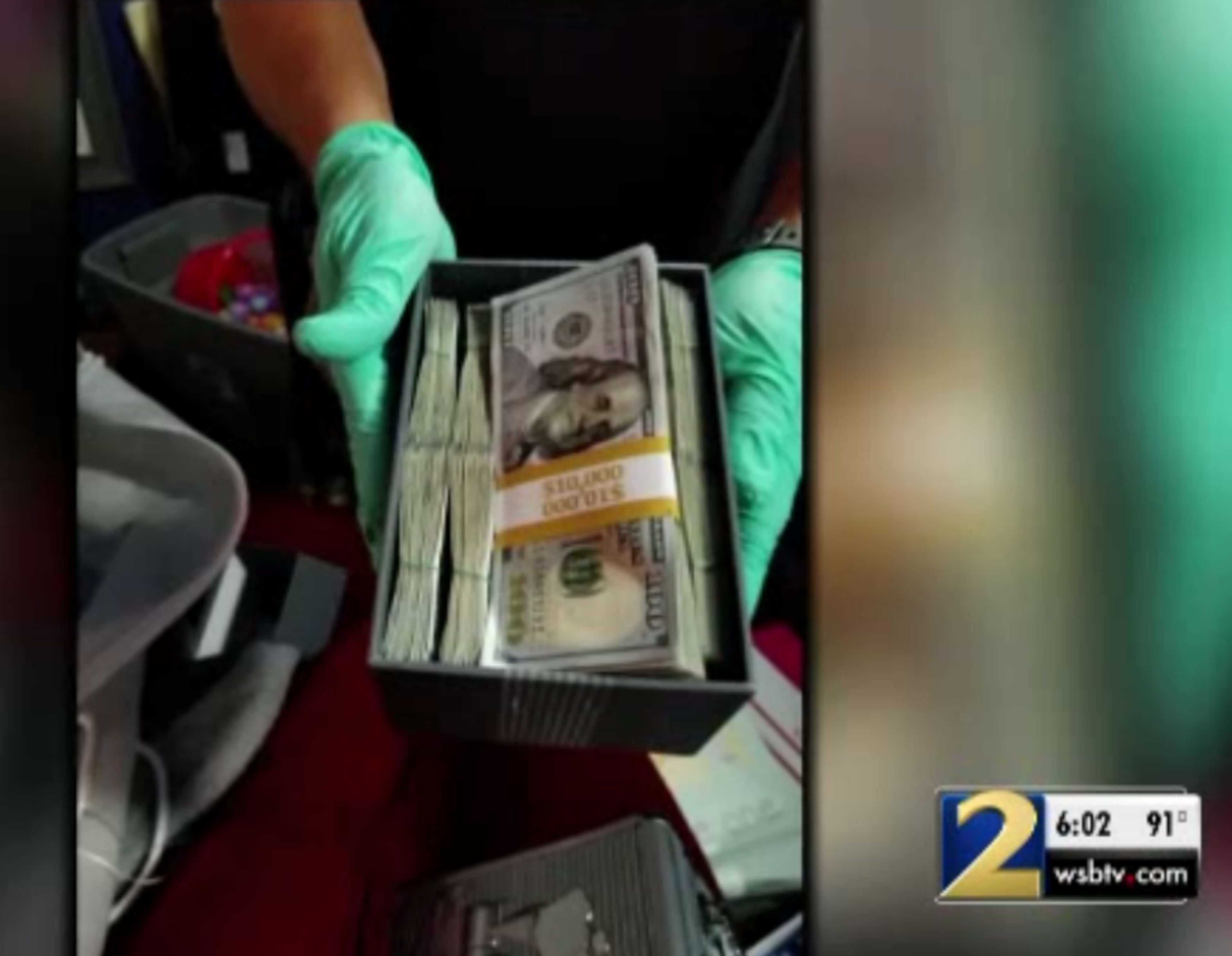 Almost $250,000 in cash was seized from one of the homes.