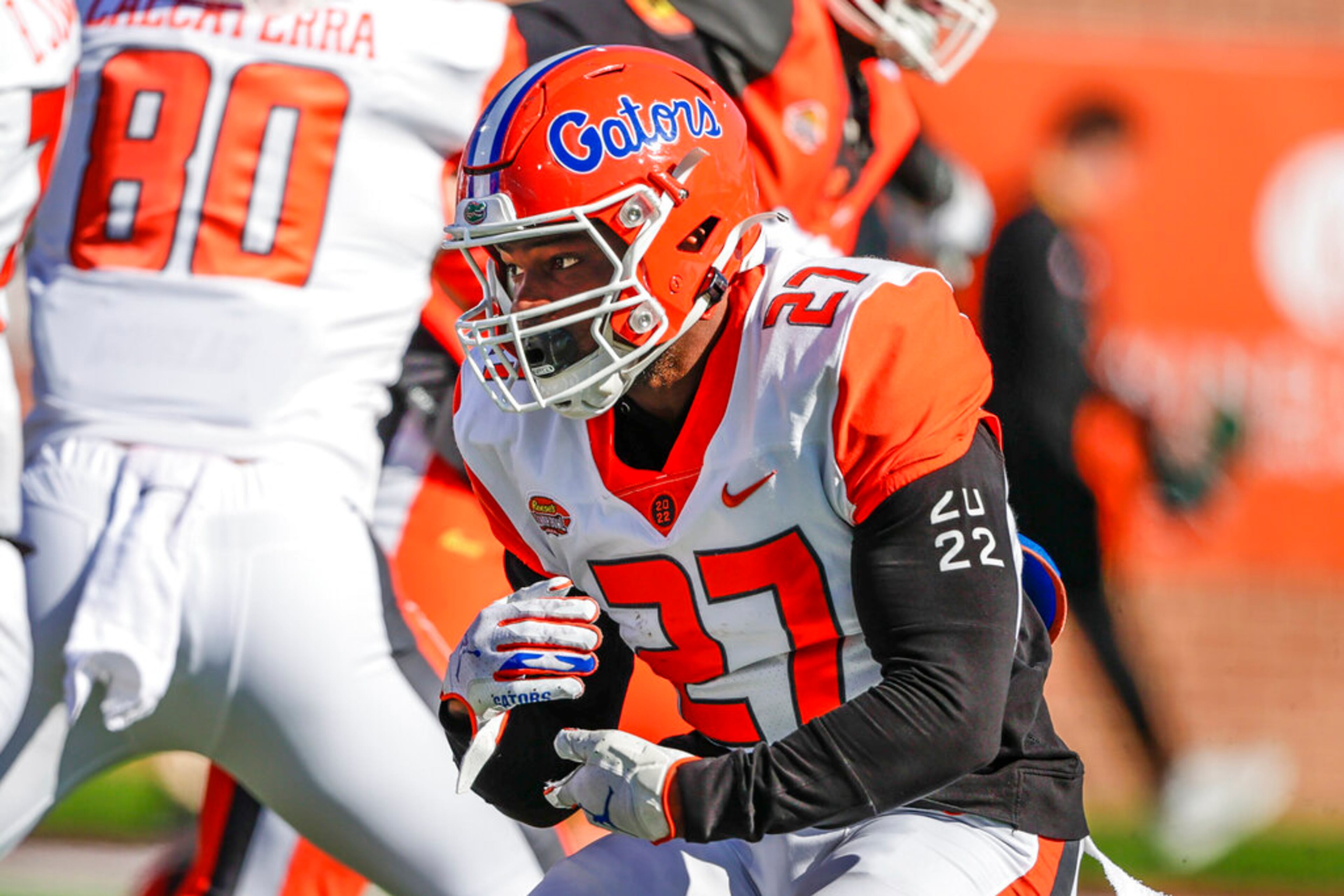 American Team running back Dameon Pierce, of Florida (27), runs the ball during the first half of an NCAA Senior Bowl college football game, Saturday, Feb. 5, 2022, in Mobile, Ala. (AP Photo/Butch Dill)