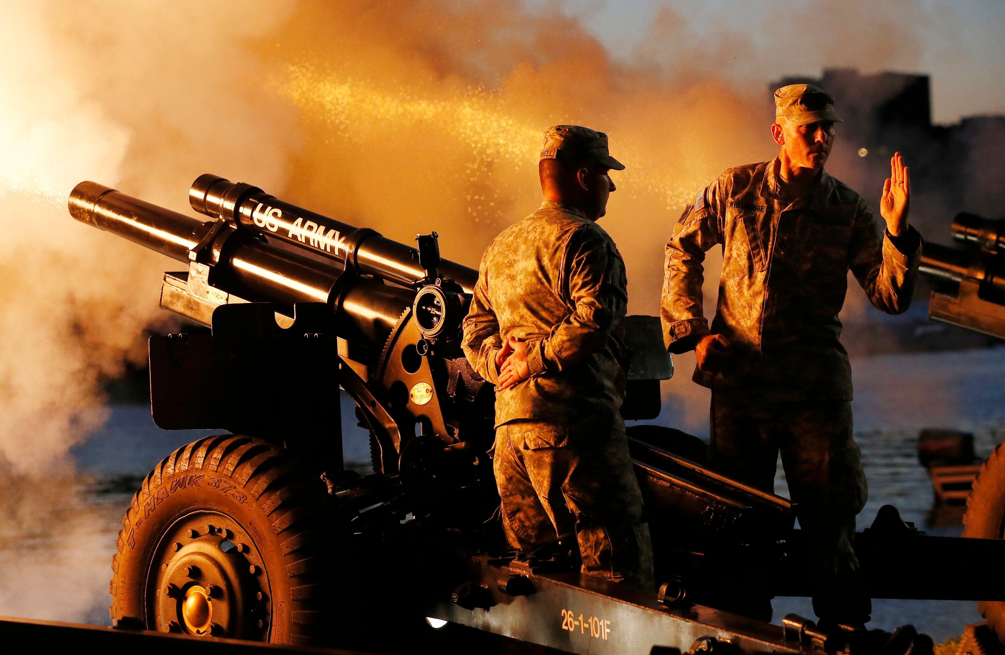 Soldiers fire canons while the 1812 Overture plays during rehearsal for the annual Boston Pops Fireworks Spectacular on the Esplanade in Boston, Sunday, July 3, 2016. (AP Photo/Michael Dwyer)