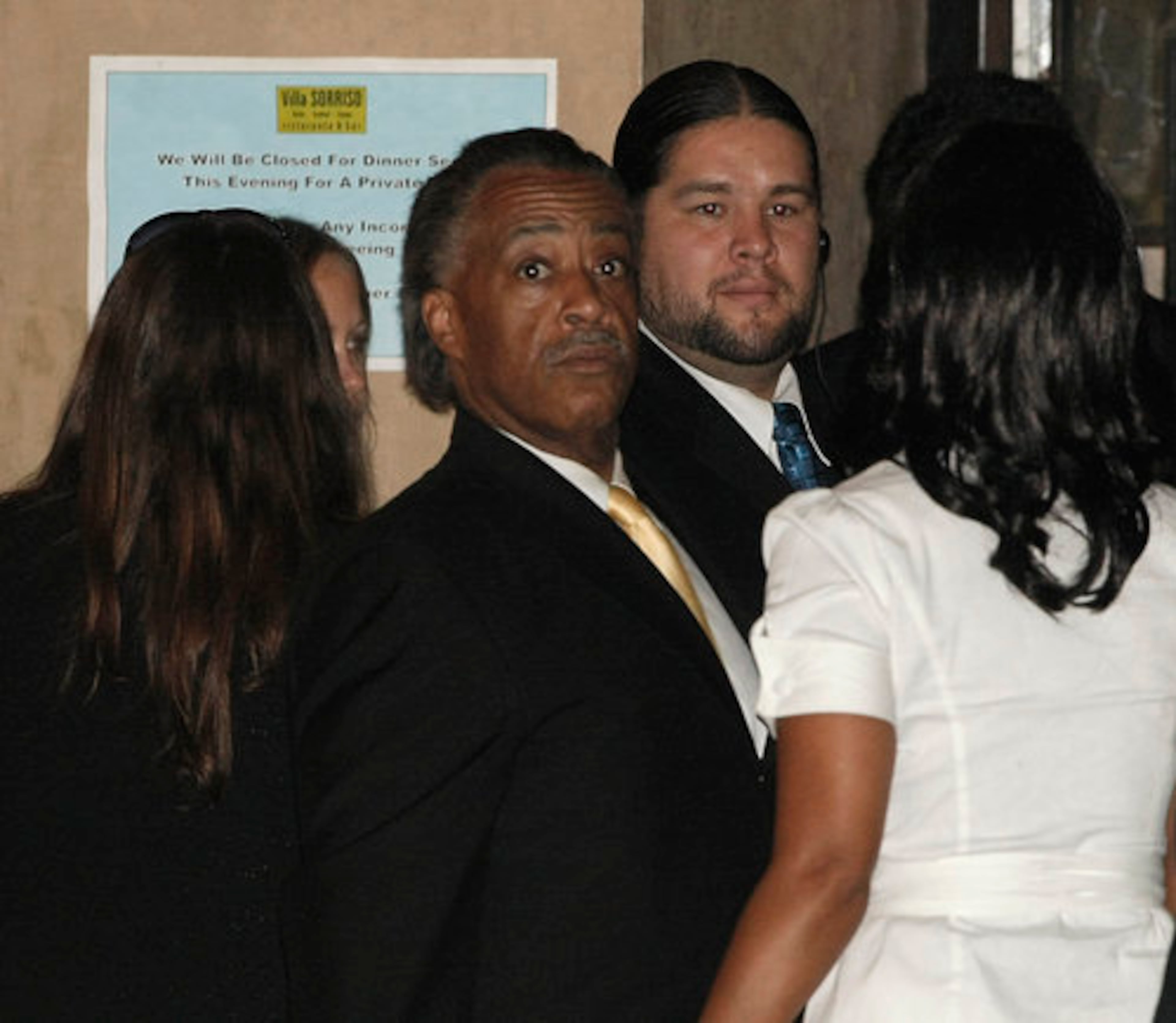 Rev. Al Sharpton arrives at the funeral reception for singer Michael Jackson at a restaurant in Pasadena, Calif. on Thursday, Sept. 3, 2009.