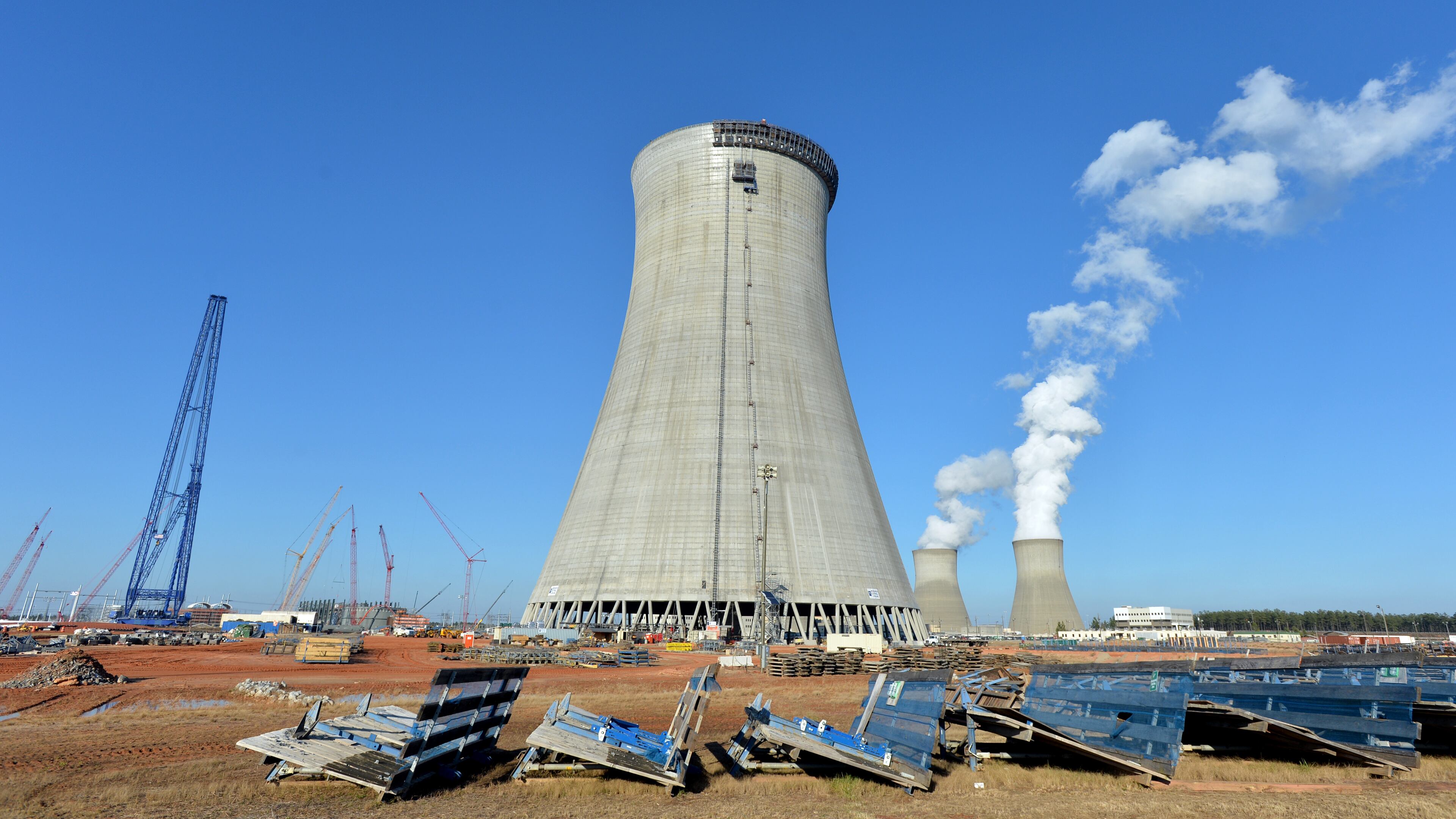 Utility commissioners on Tuesday delayed consideration of a proposal to halt collection of a nuclear surcharge on customers’ bills, to get the state attorney general’s opinion on its legality. BRANT SANDERLIN / BSANDERLIN@AJC.COM