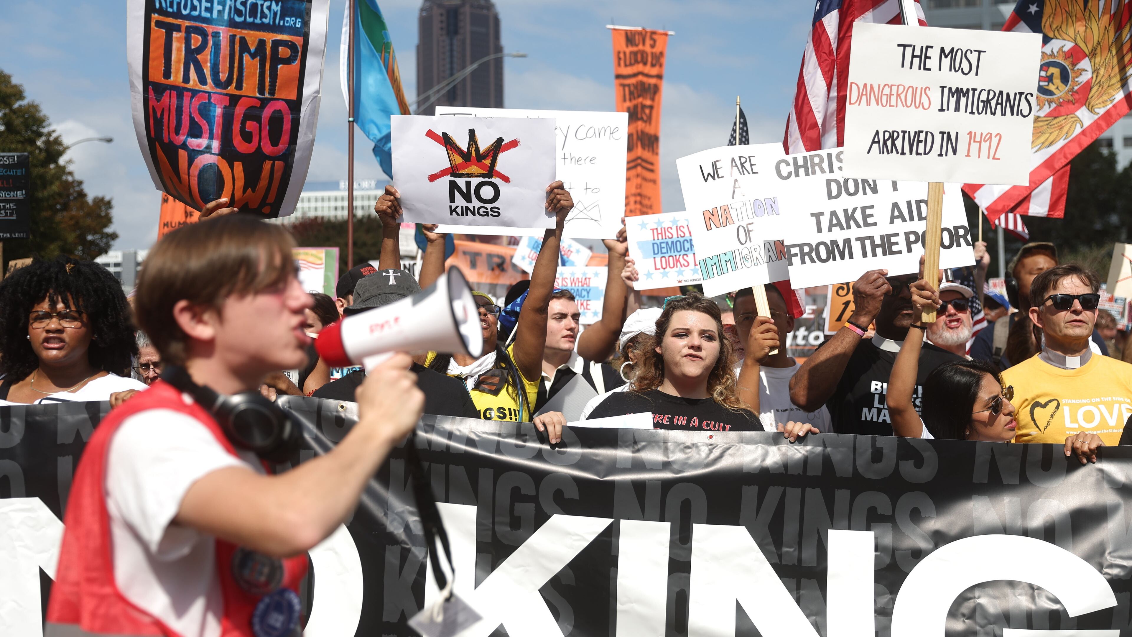 "No Kings" protesters marched down Courtland Street from the Atlanta Civic Center to Liberty Plaza on Saturday. (Abbey Cutrer/AJC)