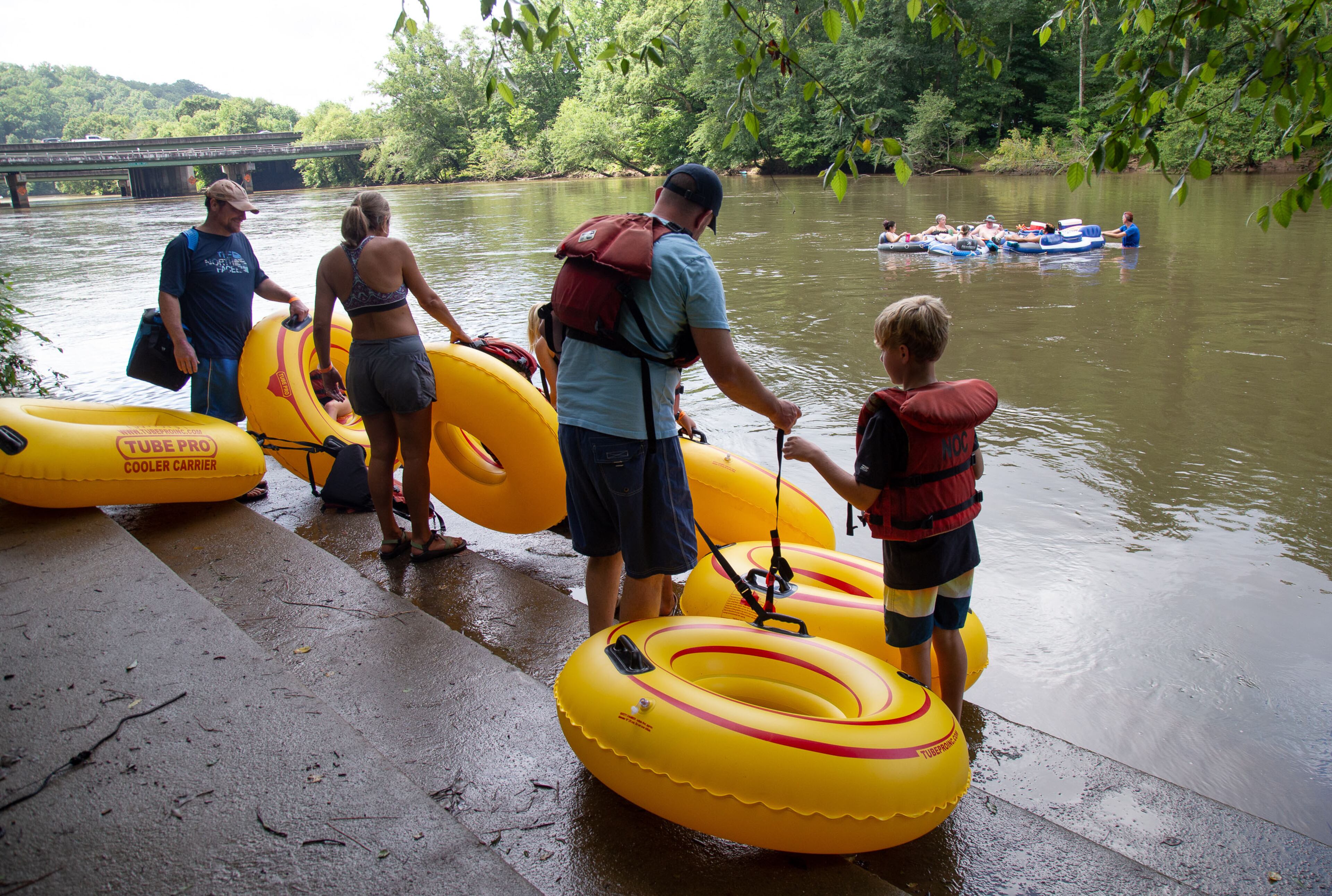 People get ready to head down the Chattahoochee River at Powers Island Park in Sandy Springs on Sunday, June 28, 2020. STEVE SCHAEFER FOR THE ATLANTA JOURNAL-CONSTITUTION