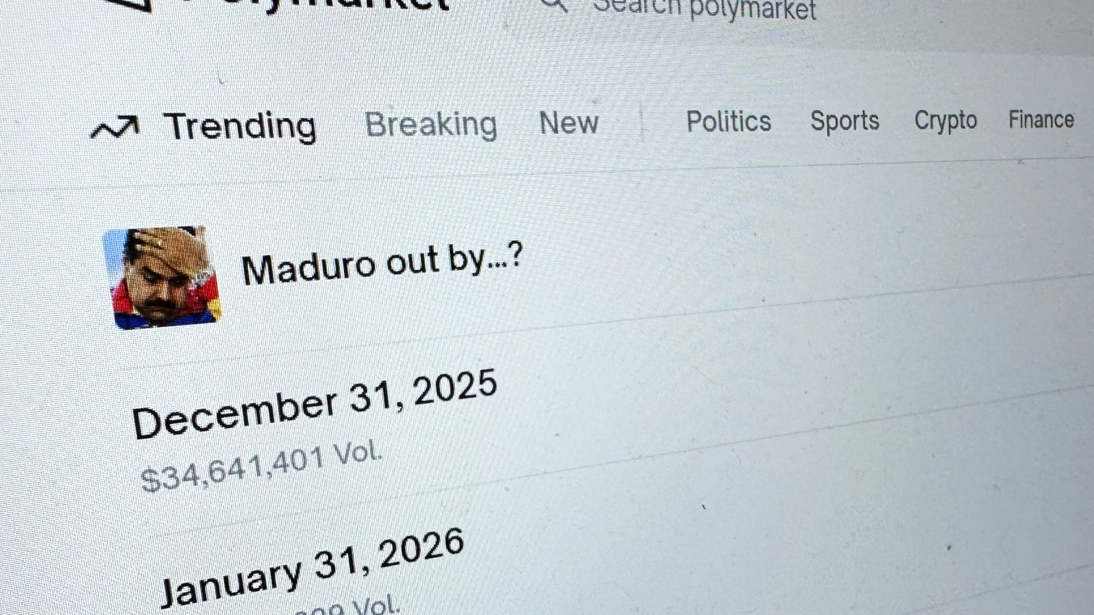 FILE - The Polymarket prediction market website is displayed on a computer screen, Jan. 11, 2026, in New York. (AP Photo/Wyatte Grantham-Philips, File)