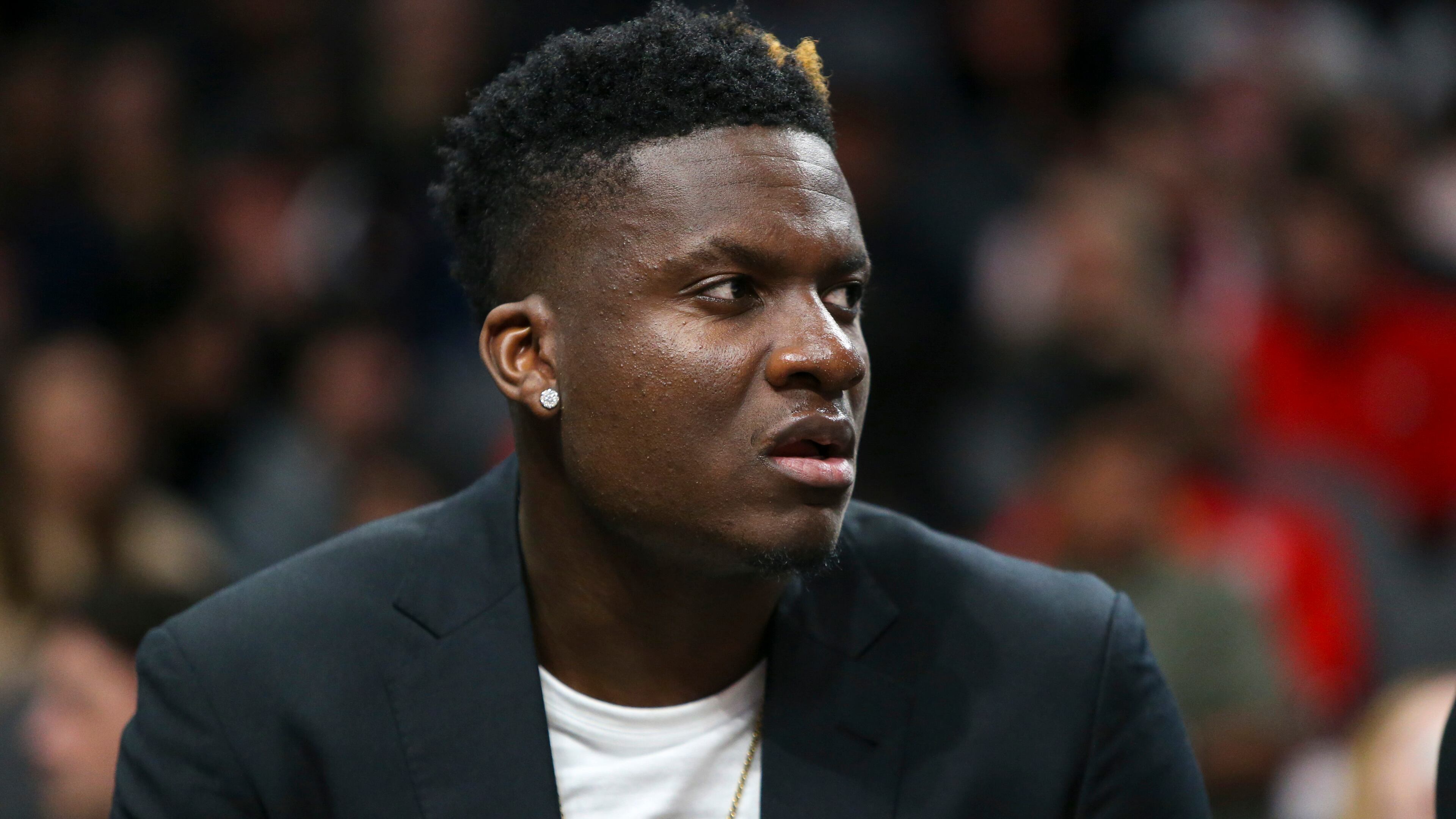 Hawks center Clint Capela (17) on the bench in the first half of an NBA basketball game against the Dallas Mavericks, Saturday, Feb. 22, 2020, in Atlanta. (AP Photo/Brett Davis)
