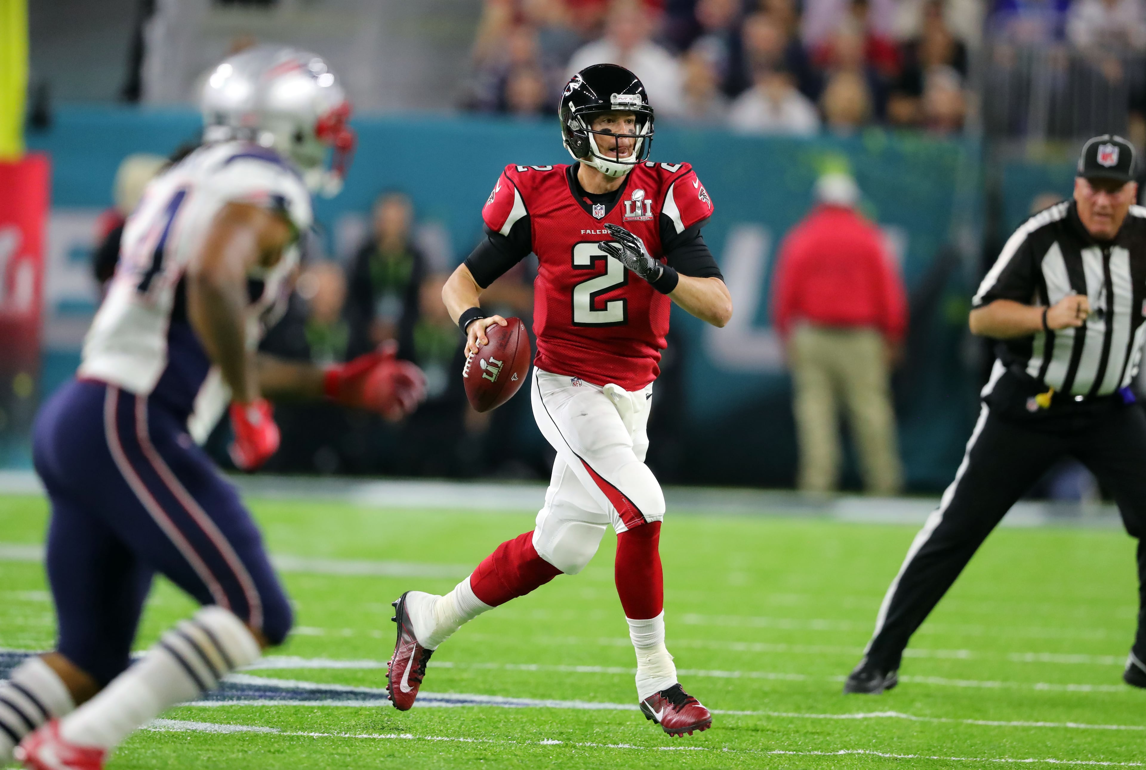 FEBRUARY 5, 2017 HOUSTON TX Atlanta Falcons quarterback Matt Ryan (2) throws on the run as the Atlanta Falcons meet the New England Patriots in Super Bowl LI at NRG Stadium in Houston, TX, Sunday, February 5, 2017. Curtis Compton/AJC