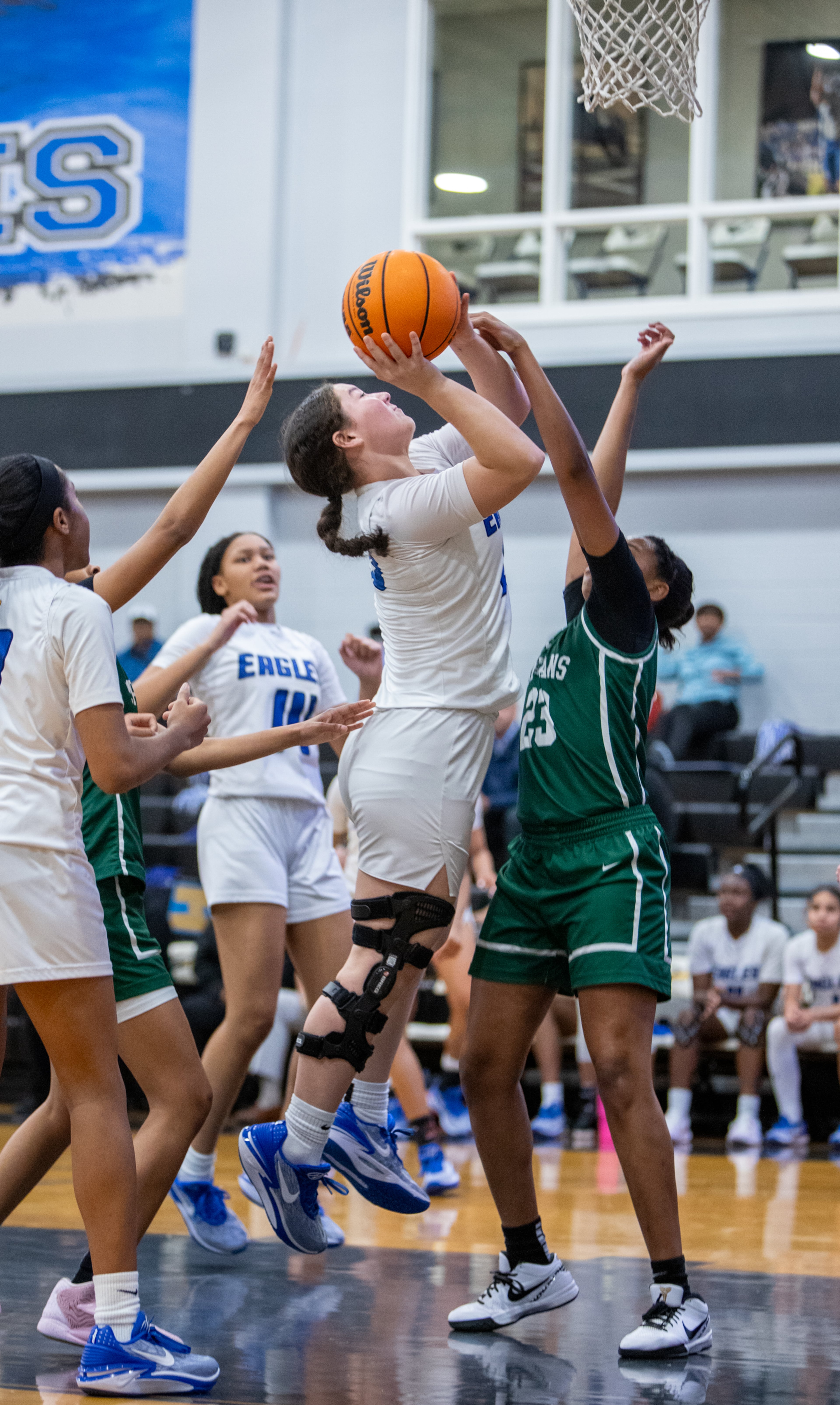 Mount Paran Christian School Sydnee Brothers #25 works to score against the Athens Academy Spartans in first half action on Friday, Feb 23, 2024. Mt Paran won the game 77 to 34. (Jenni Girtman for The Atlanta Journal-Constitution)