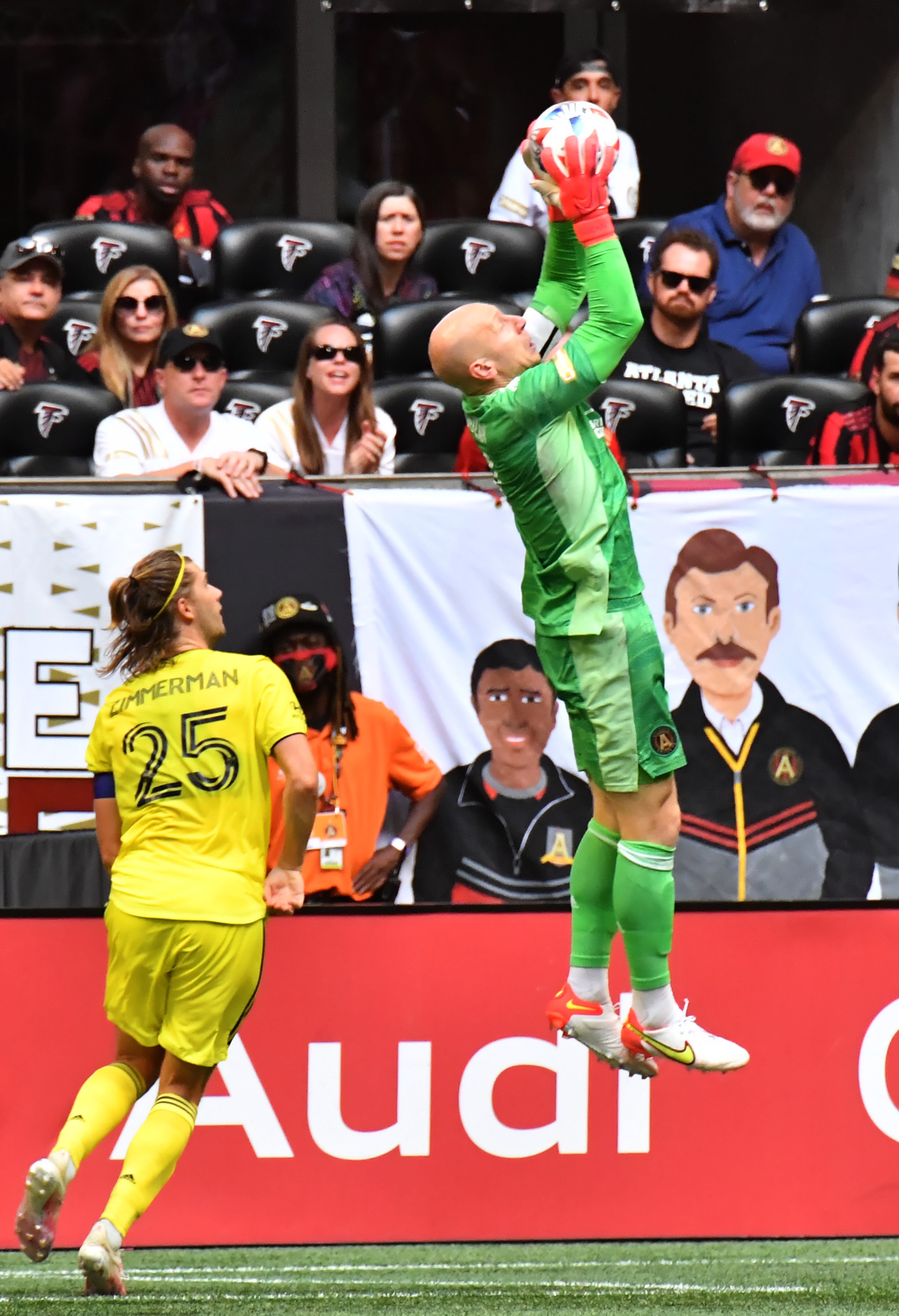 Atlanta United's goalkeeper Brad Guzan (1) grabs a ball over Nashville SC's defender Walker Zimmerman (25) during the second half in a MLS soccer match at at Mercedes-Benz Stadium in Atlanta on Saturday, August 28, 2021. Nashville SC won 2-0 over Atlanta United. (Hyosub Shin / Hyosub.Shin@ajc.com)