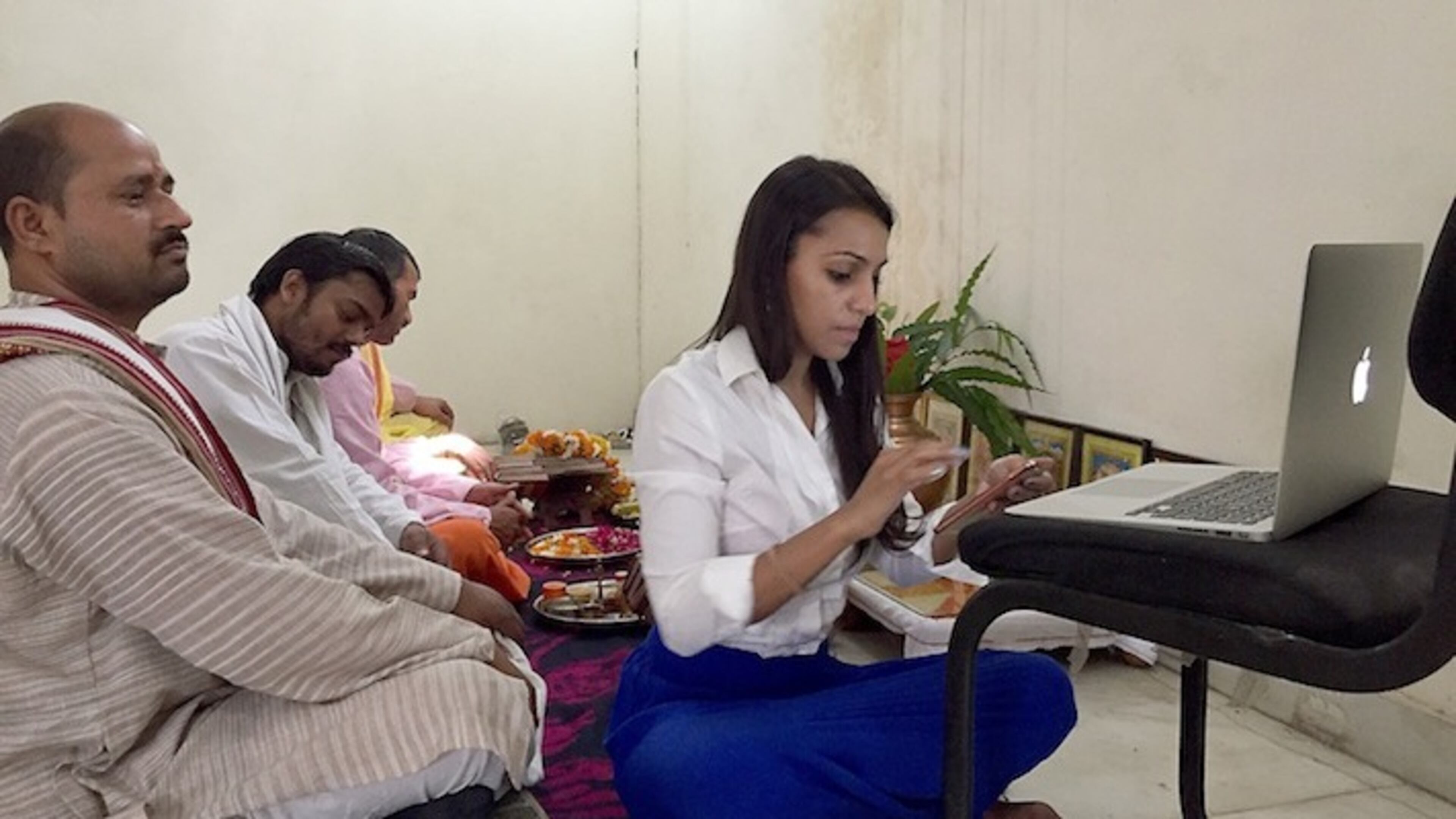 Saumya Vardhan, co-founder of Shubhpuja.com, prepares for an online service at a temple in Noida, India. (Shashank Bengali/Los Angeles Times/TNS)