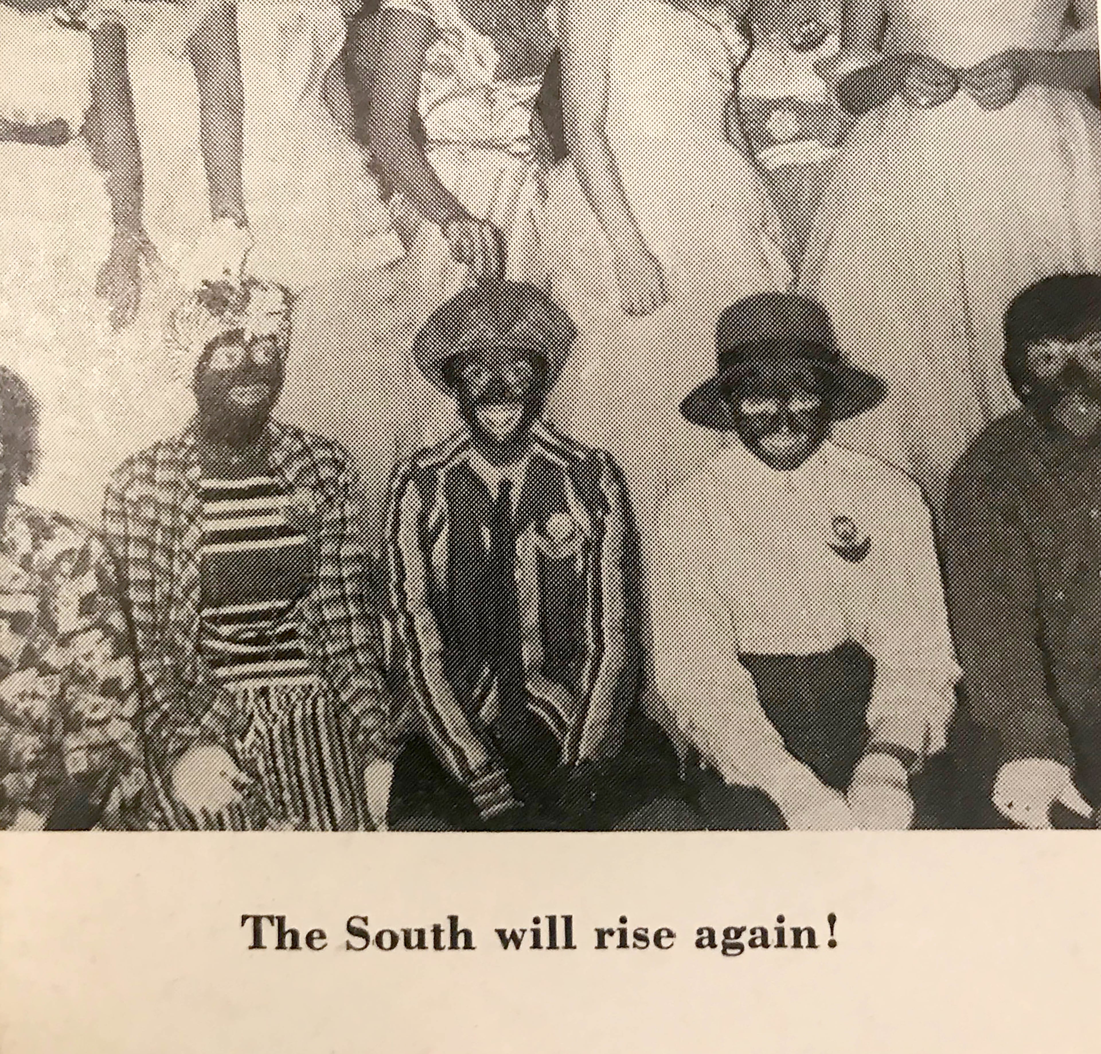 The 1958 yearbook of The University of Georgia shows a photo of students in blackface with the caption "The South will rise again!"